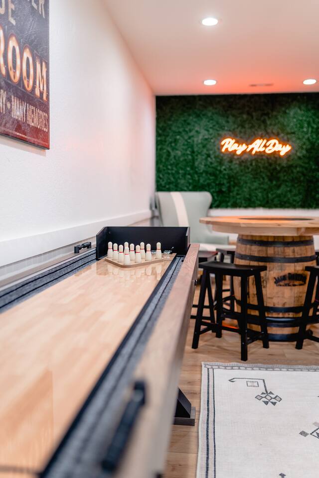 Hours of fun in this game room! You could  "play all day" with the foosball, shuffleboard, air hockey, arcade, and poker set!