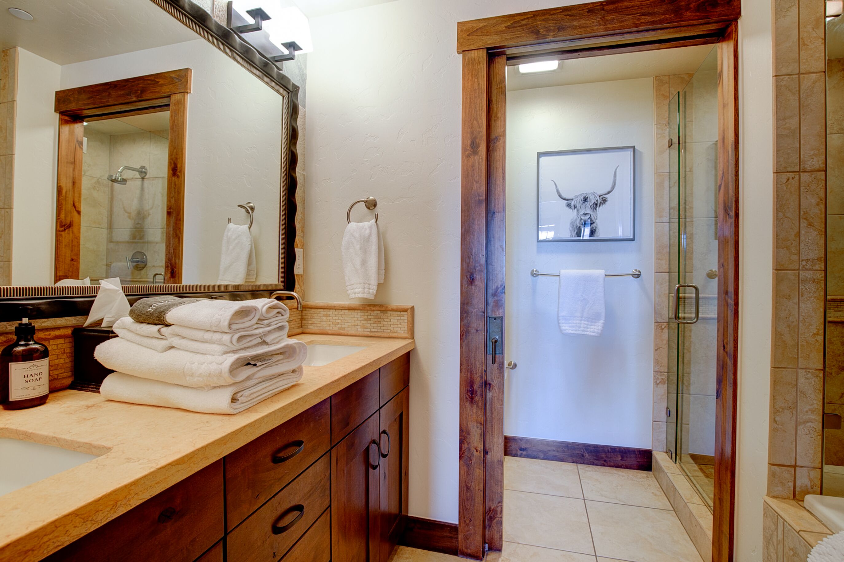 Primary bath with double sinks, shower and deep soaking tub