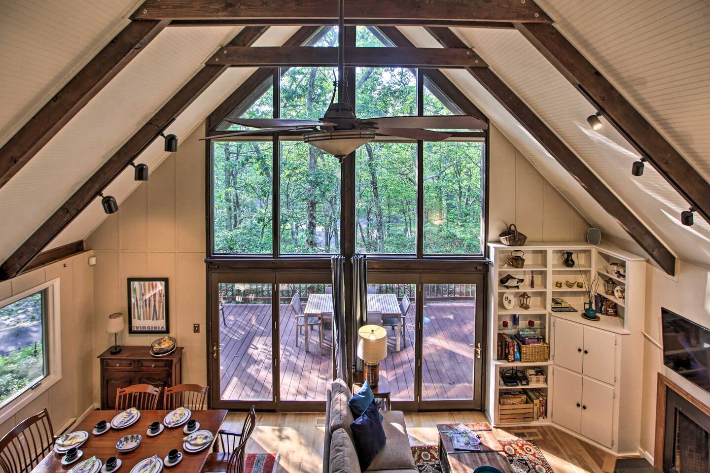 Forest views permeate this rustic-yet-cozy cabin.