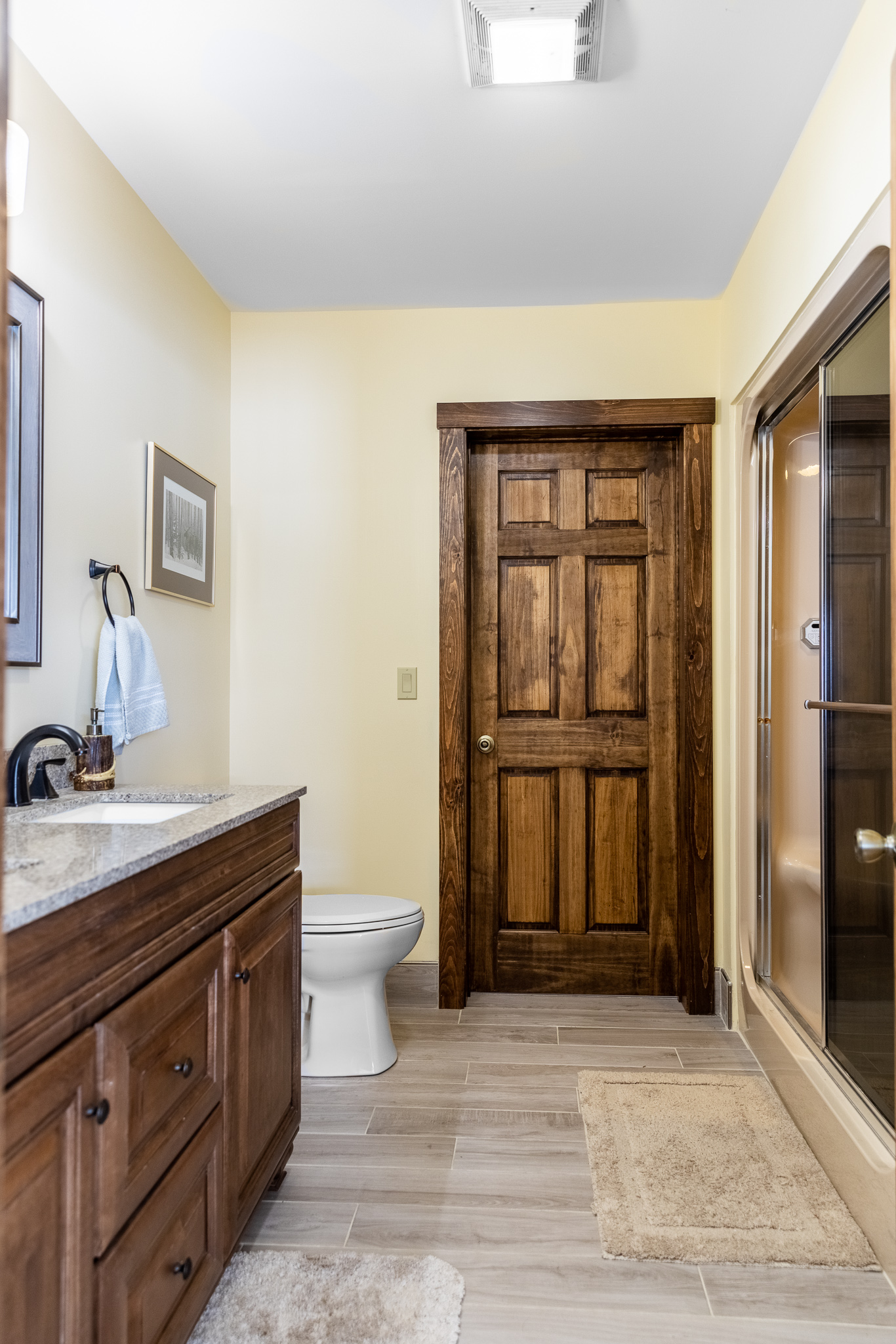 Main floor bathroom, double sinks, steam shower.