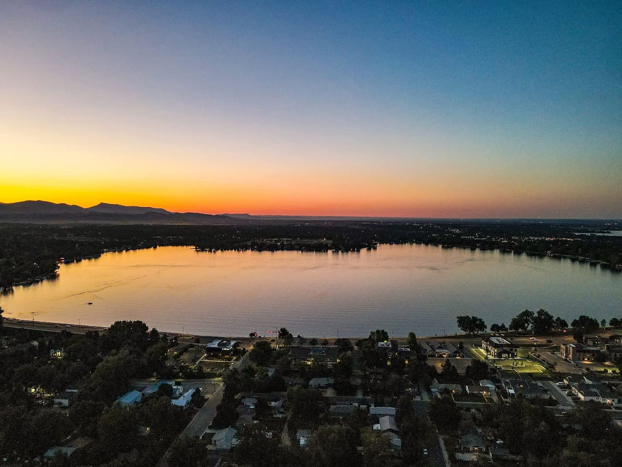 Lake Loveland is so beautiful and just a 3 block walk to get there from our house.  Once you get there take in the views or take a walk all the way around the lake!