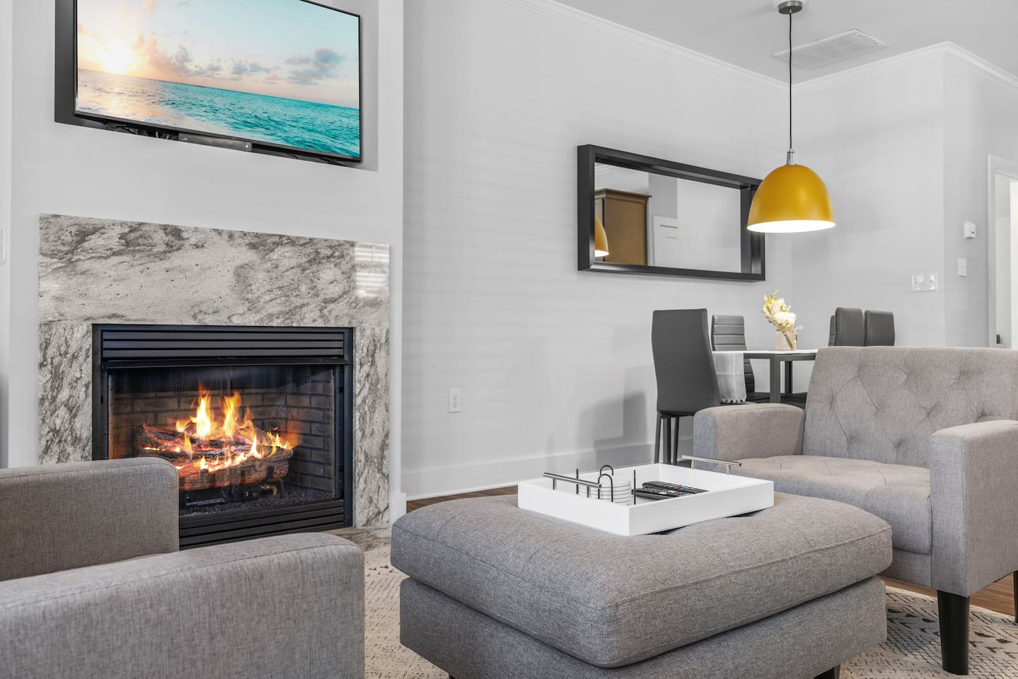 Gather around the stone fireplace and smart TV for cozy nights in.