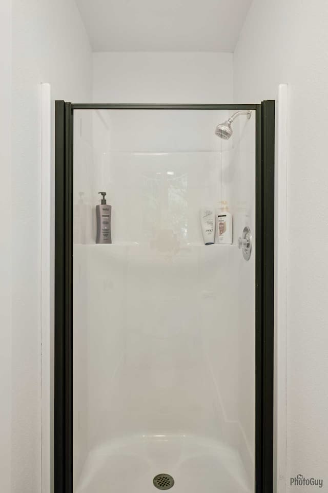 Master bathroom single shower stall, in separate room coming out of master bathroom which has this shower stall and toilet