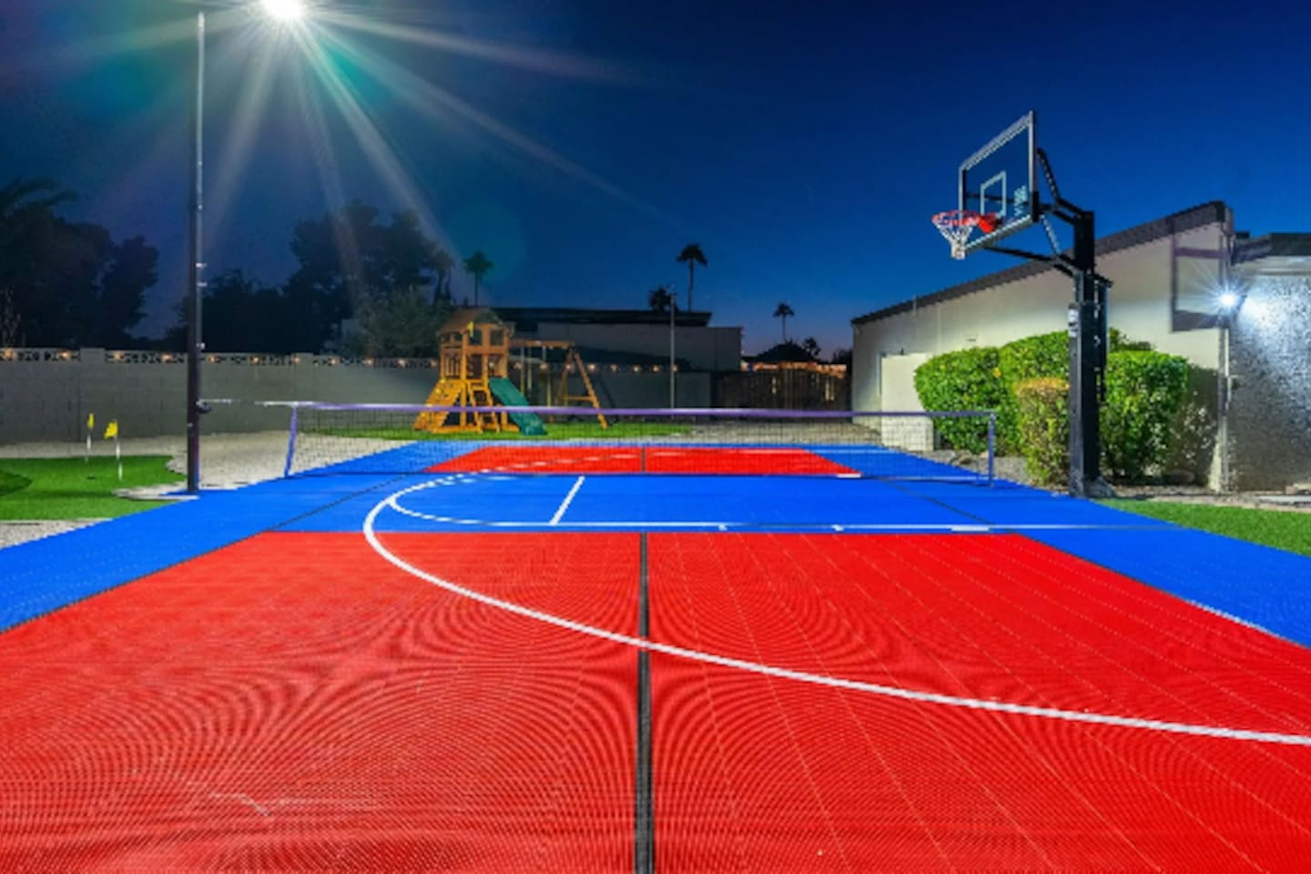 Under the lights, the sport court takes on a whole new energy, perfect for a game that runs past sundown.
