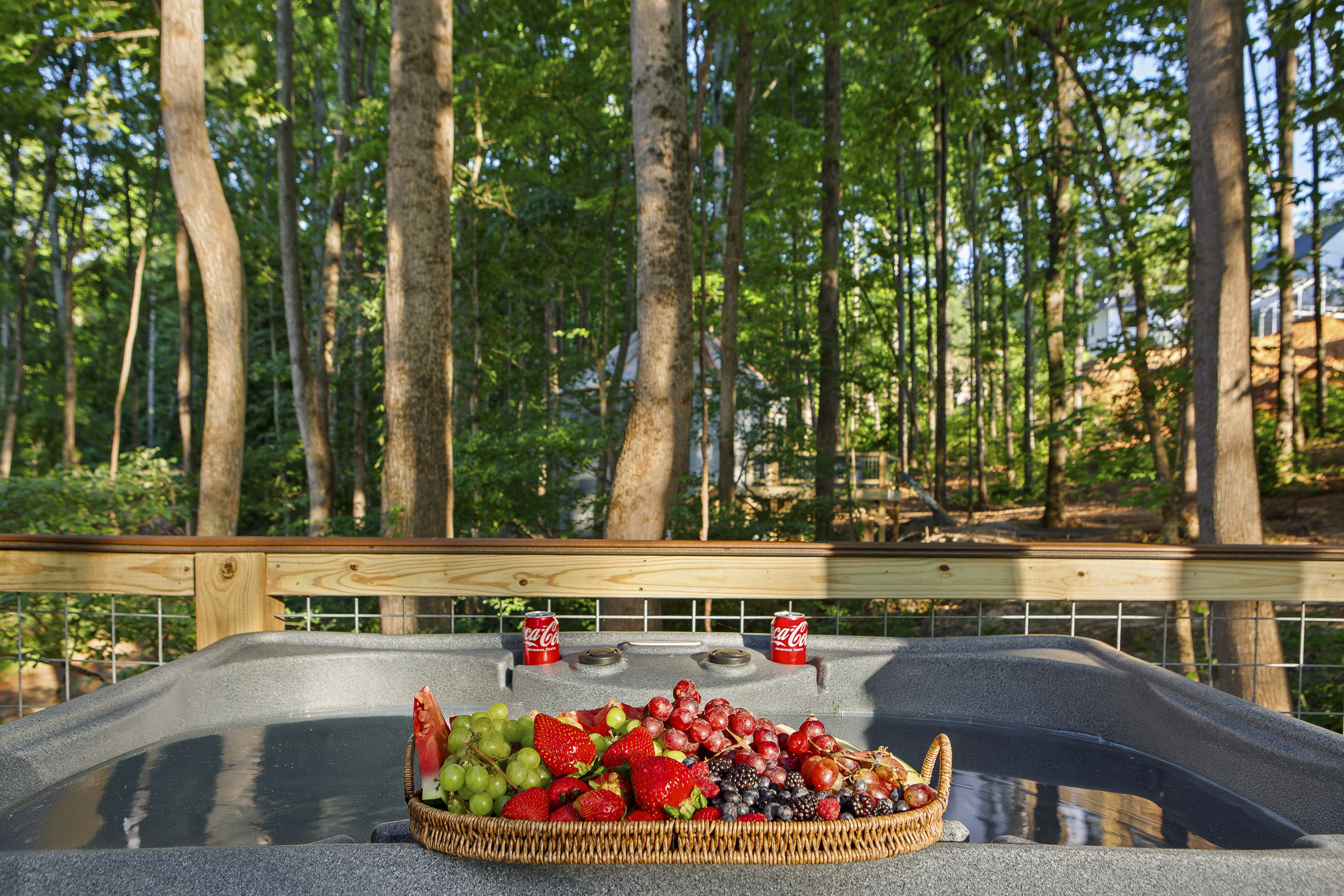 Hot Tub Retreat: Unwind in the hot tub surrounded by lush woods and fresh fruit delights!