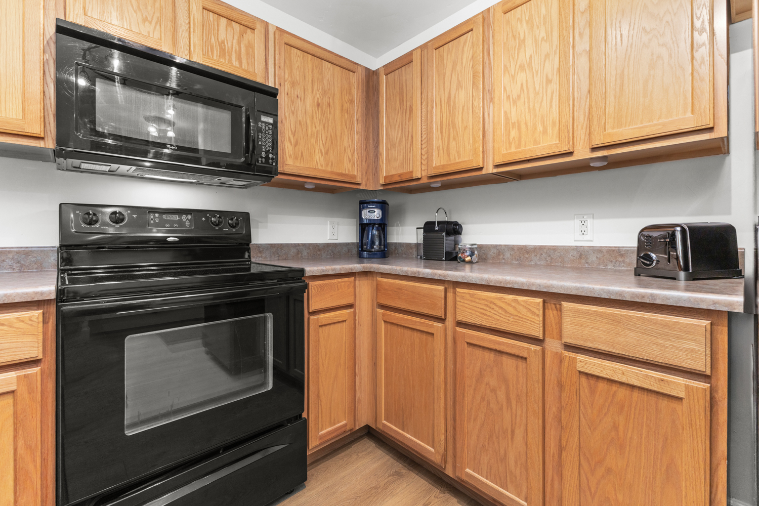 Kitchen | 4 burner electric stove | Bread Toaster