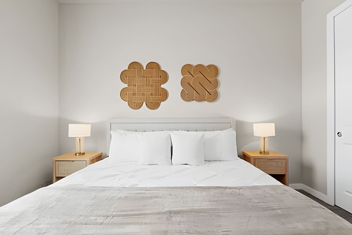 Relax in comfort in this bright, minimalist bedroom.