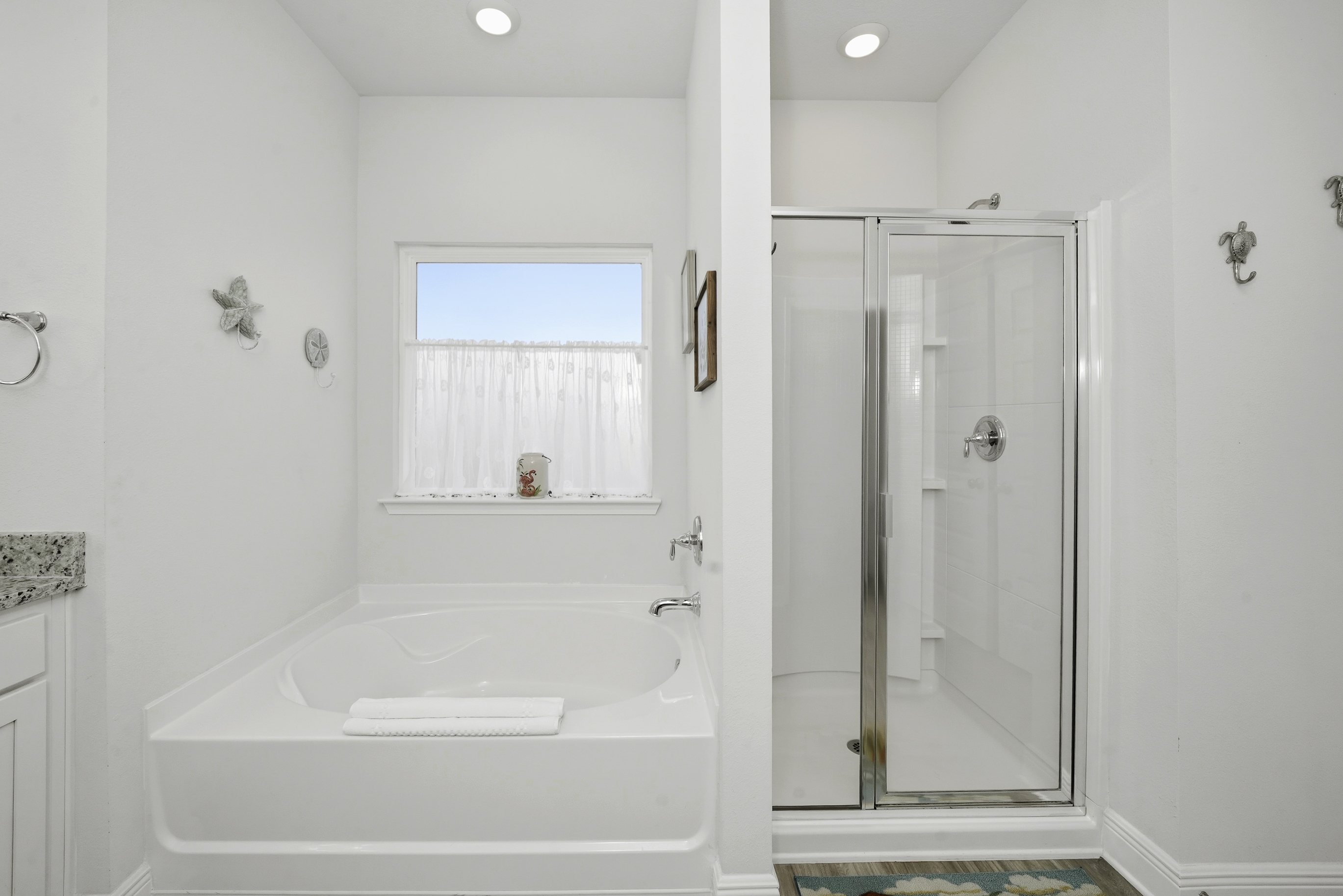 Spacious bathroom with natural light and modern fixtures