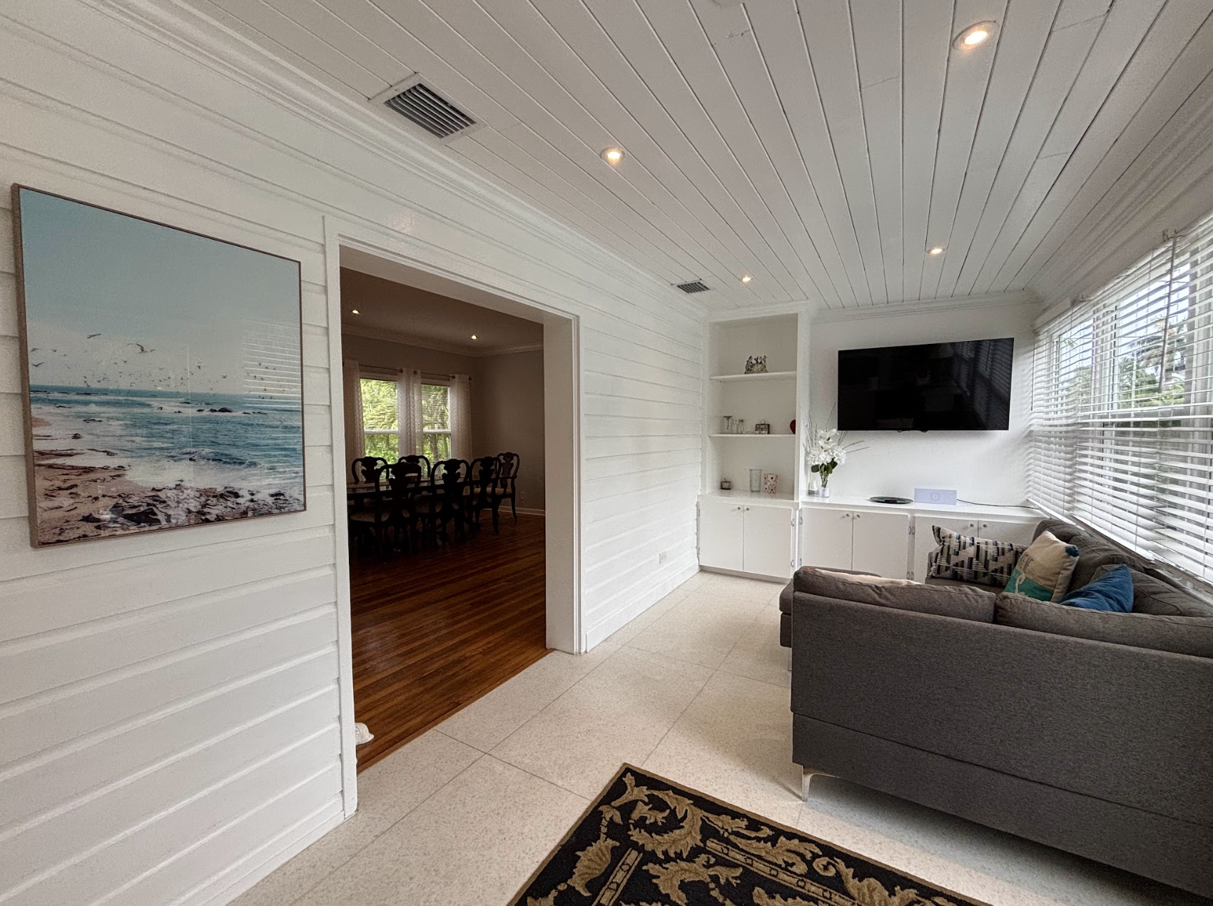 The "Florida Room" is sunny, spacious and receives a wonderful amount of natural light.