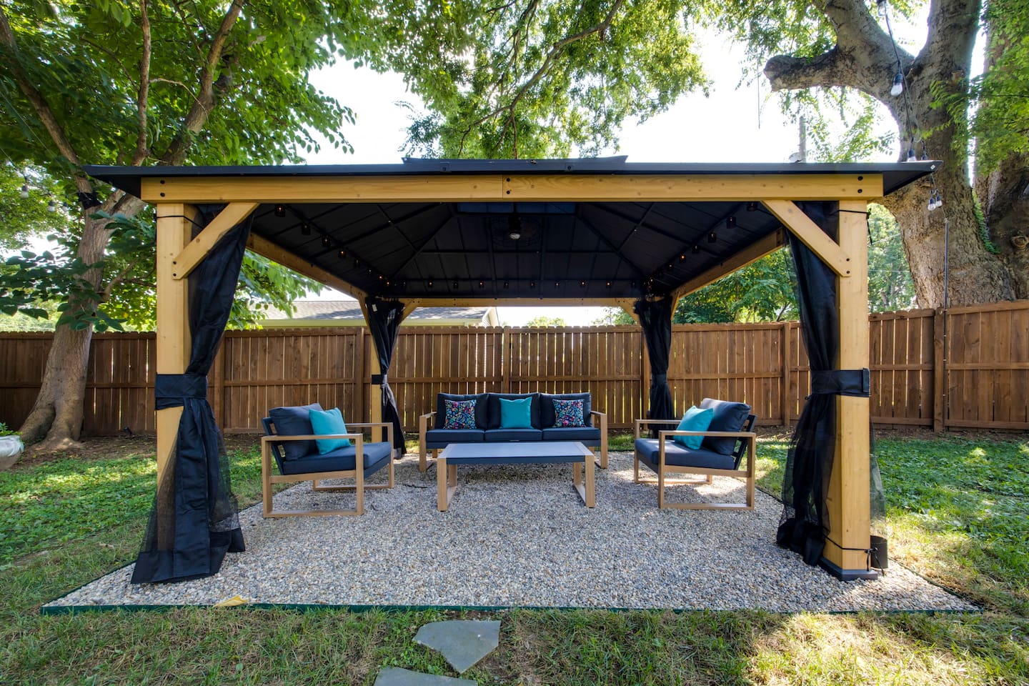 Backyard gazebo goals: quiet mornings, warm nights, and Southern charm all around.