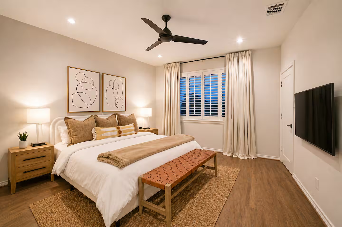 Serene primary suite with elegant design