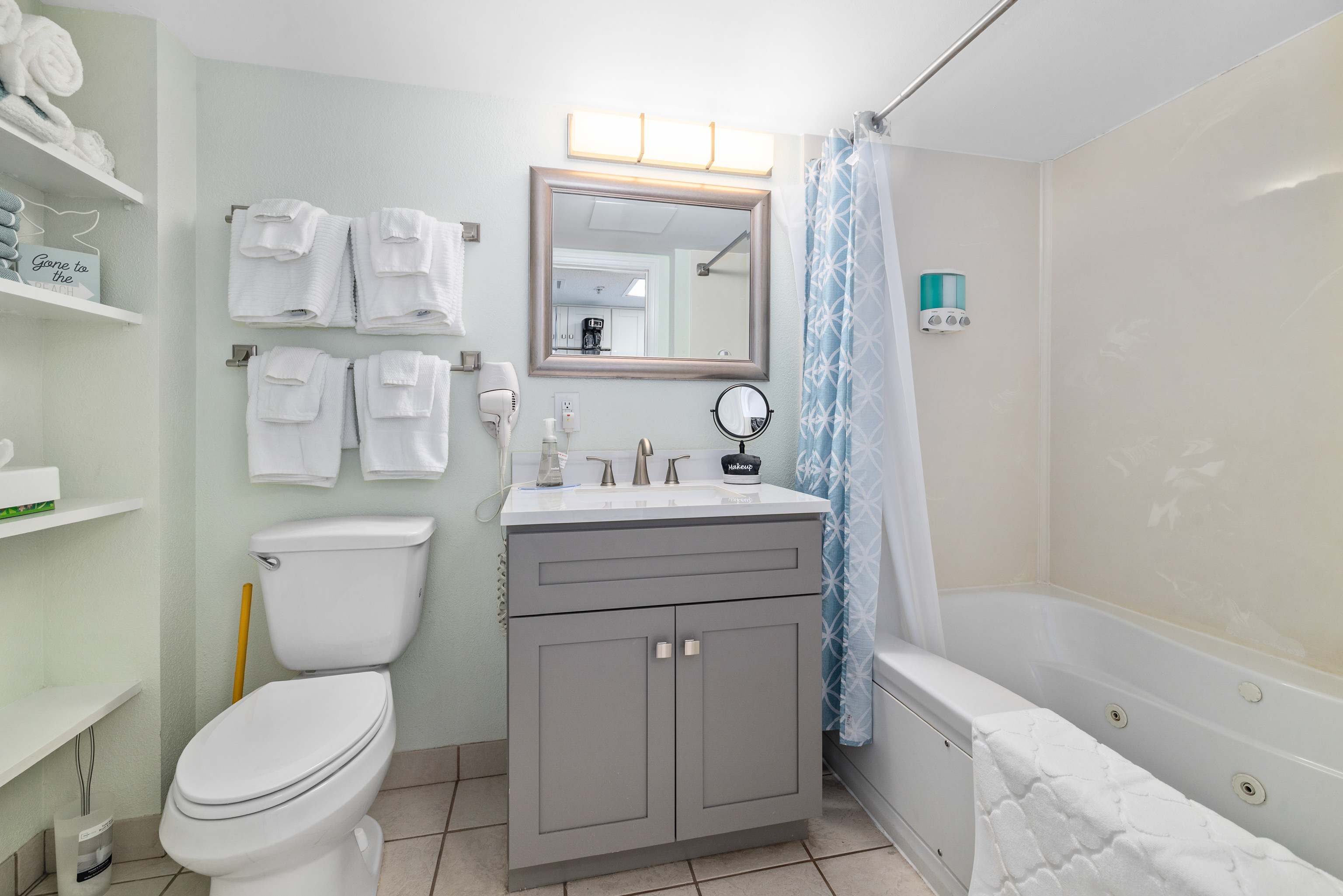 Bathroom with Tub Full bathroom with tub — perfect for a relaxing soak after a day in the ocean or pools. Clean, bright, and family-friendly bathroom with tub/shower combo. Fresh towels and toiletries provided for a worry-free stay.