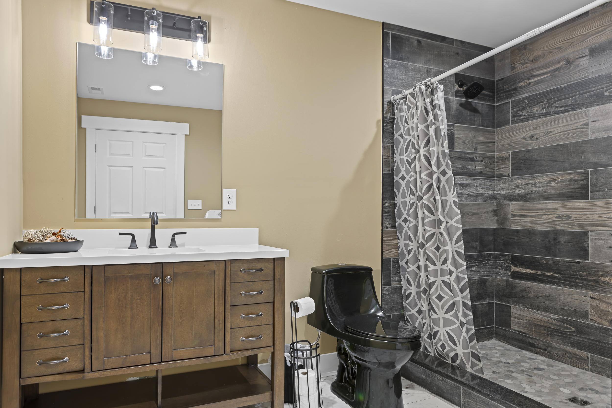 Bathroom Retreat: Modern fixtures, chic decor, and a spa-like shower await your relaxation!