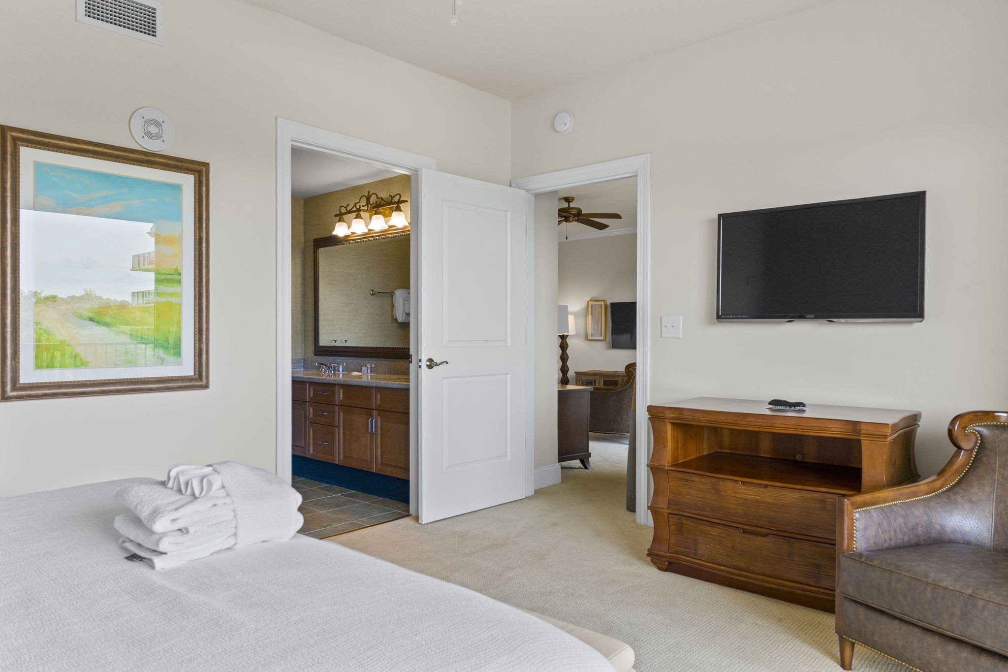Master Bedroom featuring a King bed, balcony access overlooking the intracoastal waterway and ensuite bathroom