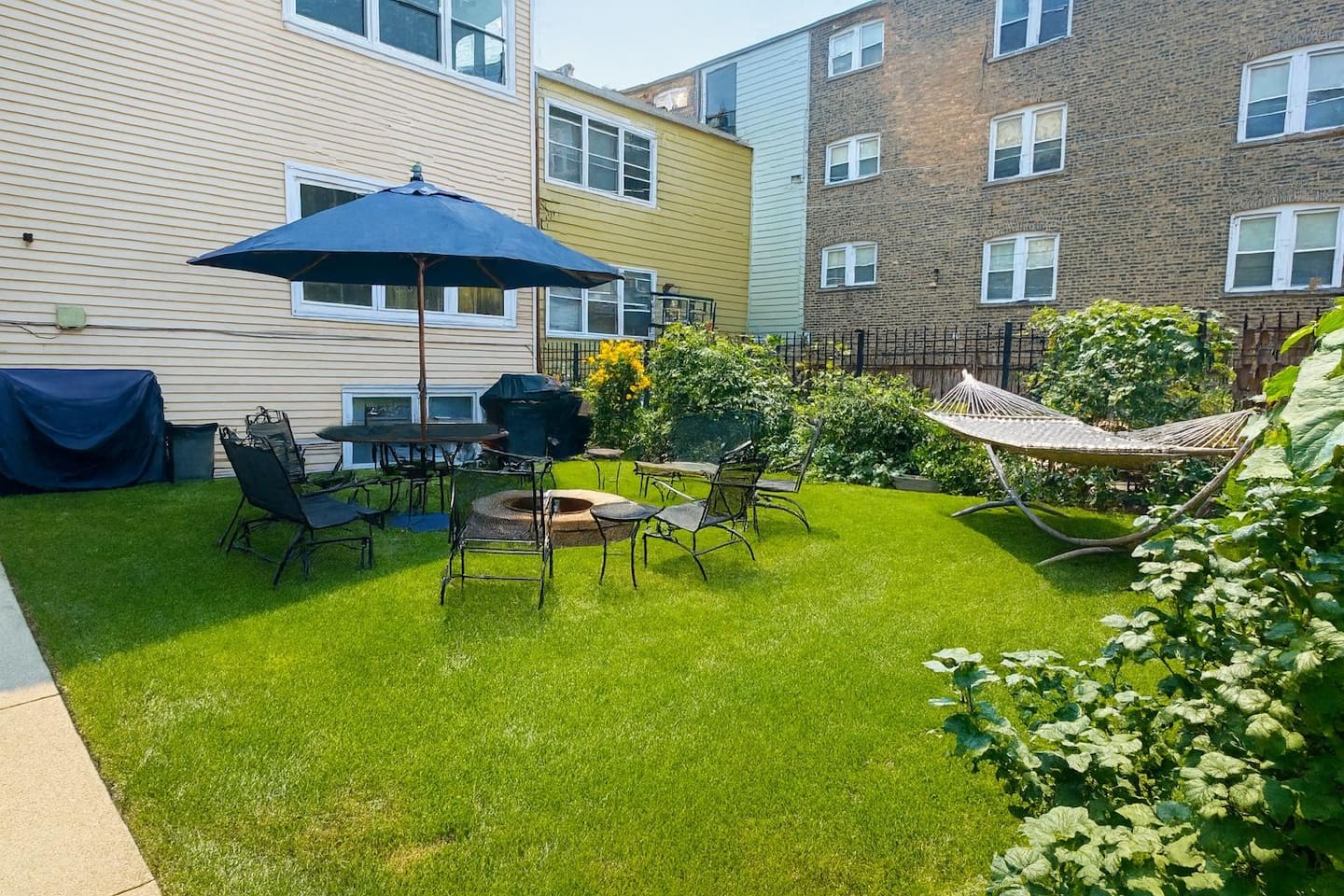 Private backyard with outdoor seating perfect for relaxing.