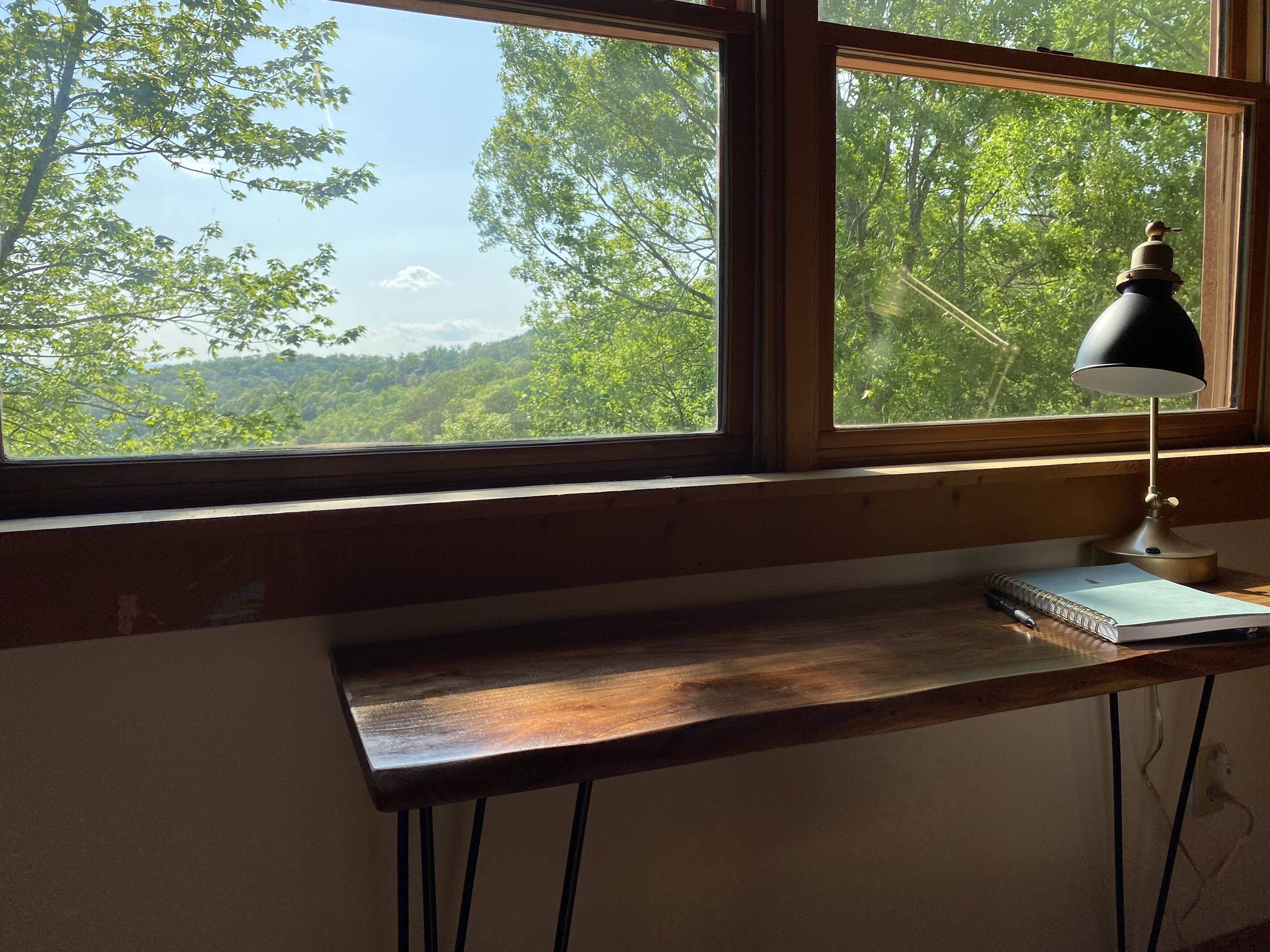 Desk area in the upstairs king bedroom has one of the best views in the cabin. 