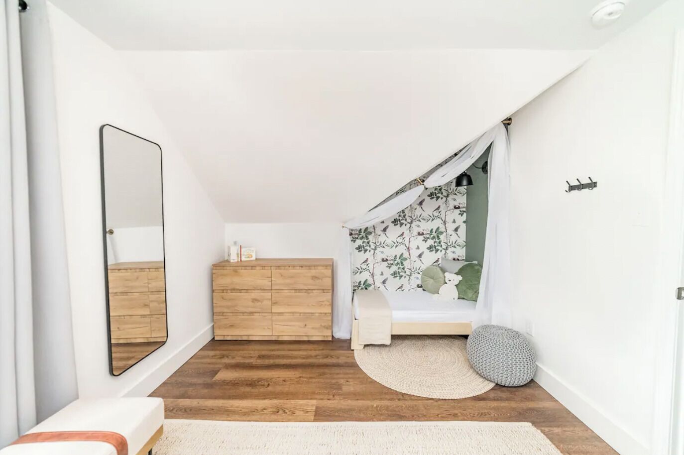 Across from twin beds in Bedroom #5 is a dresser and a cute toddler bed alcove!