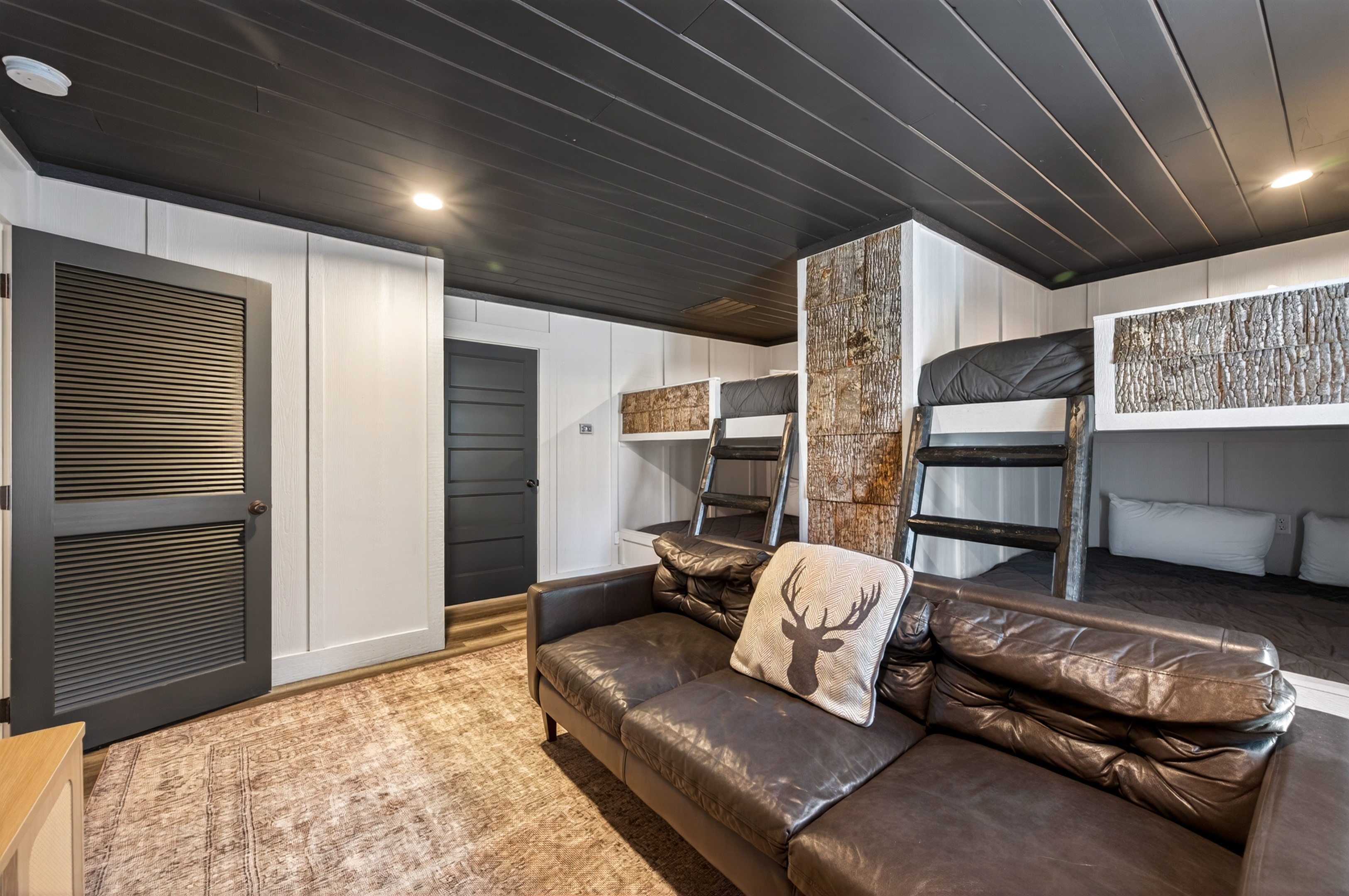 Bunk room with attached bathroom.