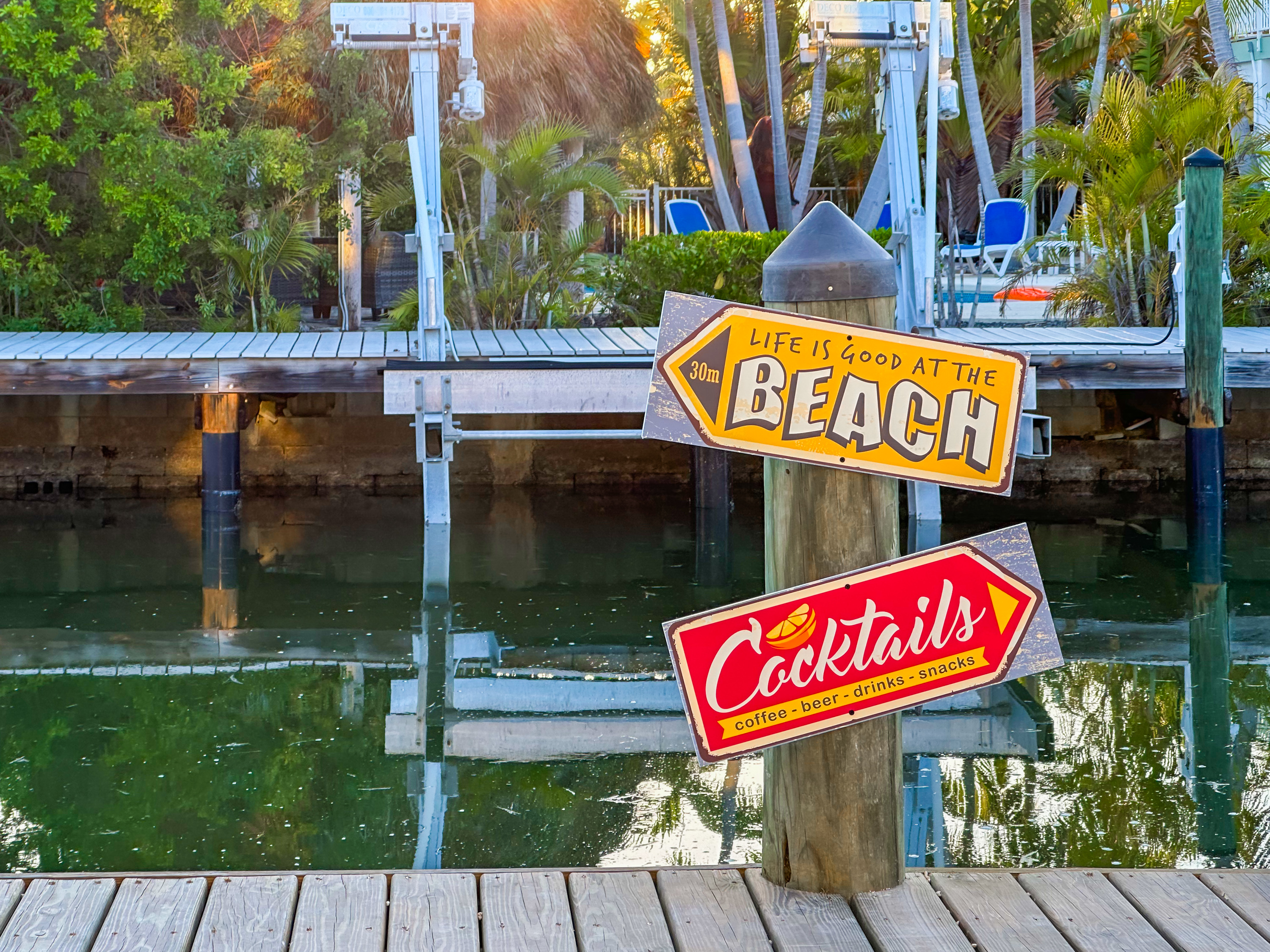 ...A spectacular canal home with a 100' dock.