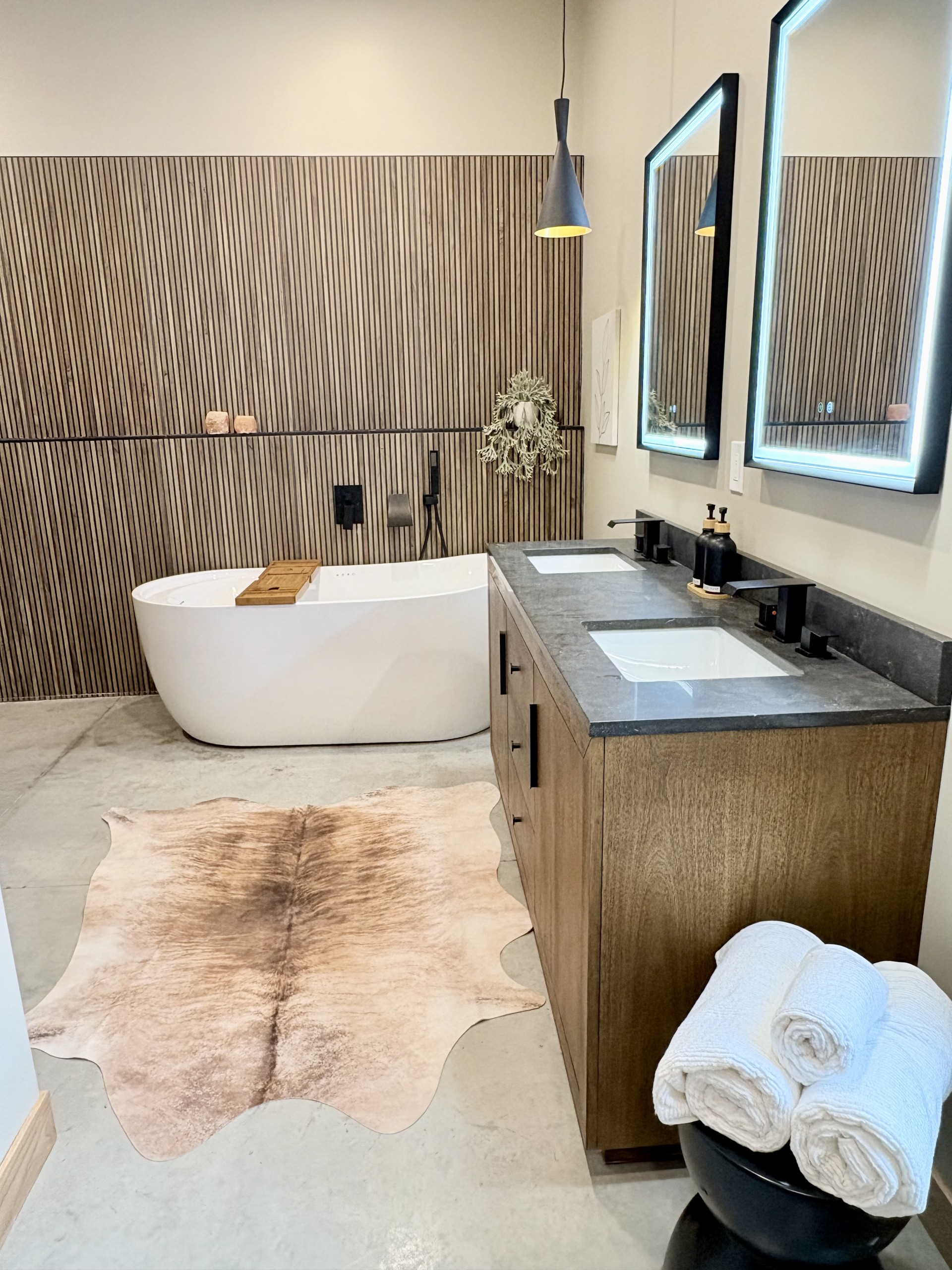 Primary Bath includes a wet room featuring a walk-in shower and a jetted jacuzzi tub