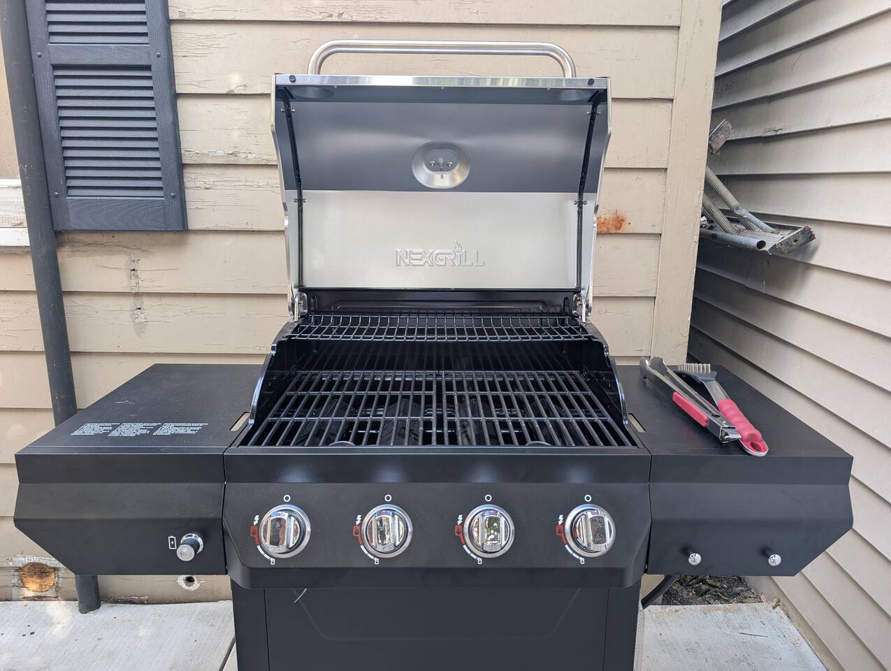 Outdoor BBQ grill for easy cookouts and outdoor dining.
