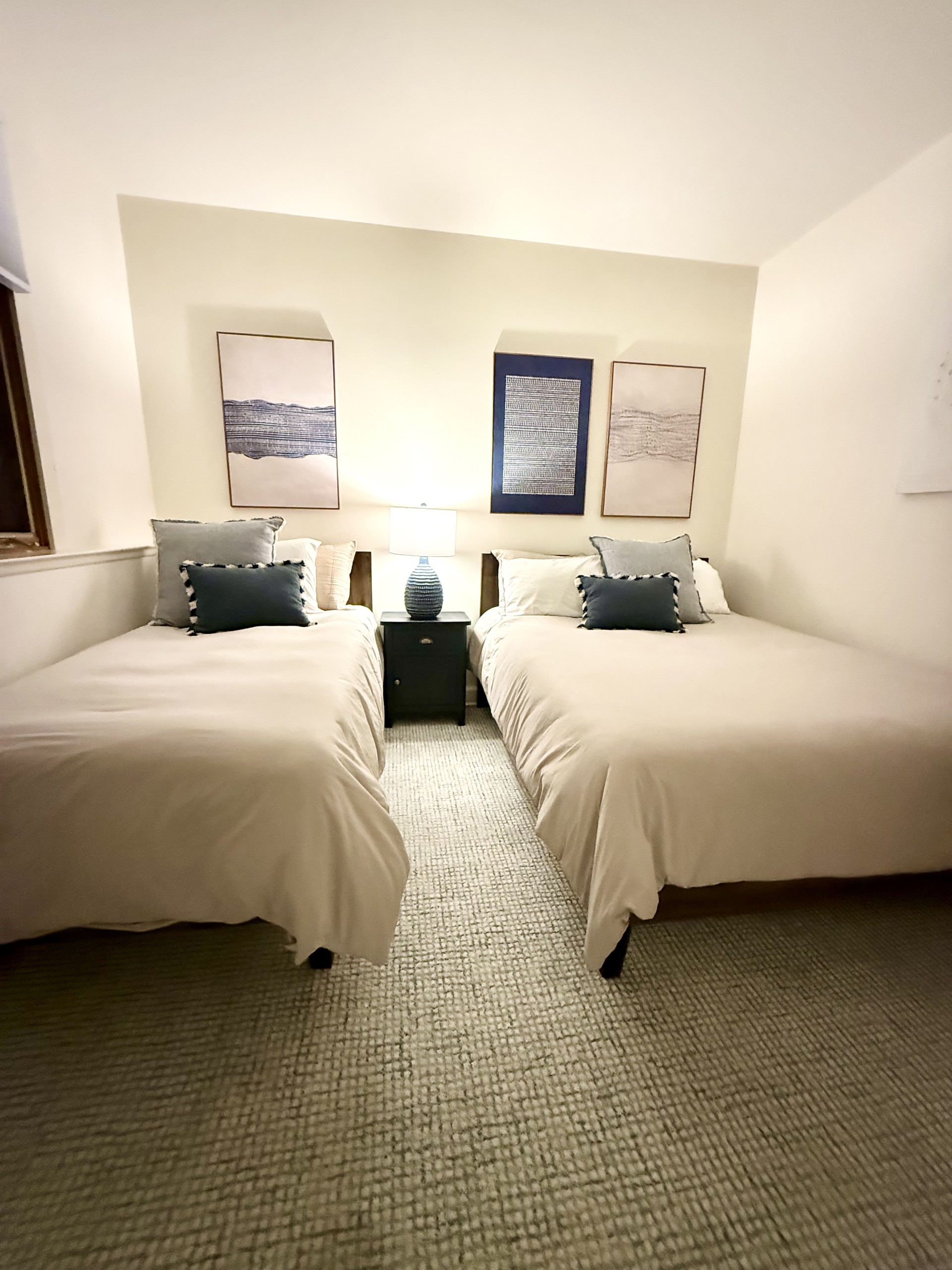 Our 2nd bedroom contains one queen bed and one twin XL with premium mattresses, a 55"smart TV with Disney Plus, Hulu, Peacock, Max and Amazon Prime as well as a PlayStation 4 for "down time."