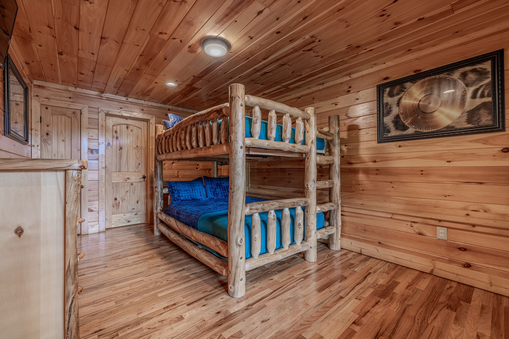 This room gives extra guests a comfortable place to land after the show, with a playful music-inspired feel that is not too childish.