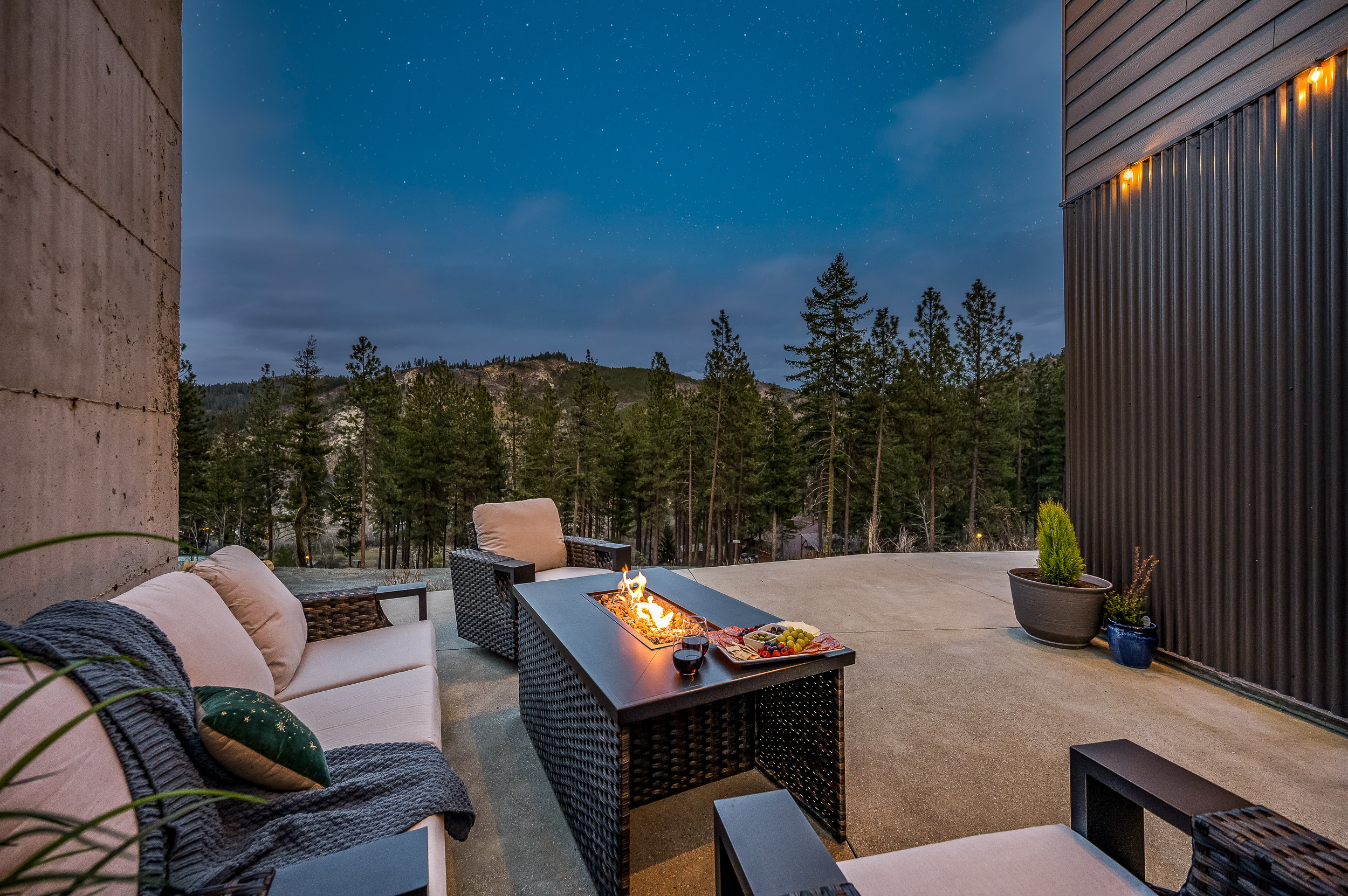 Outdoor lounge seating with fire table, rocking chairs, BBQ grill (propane provided)