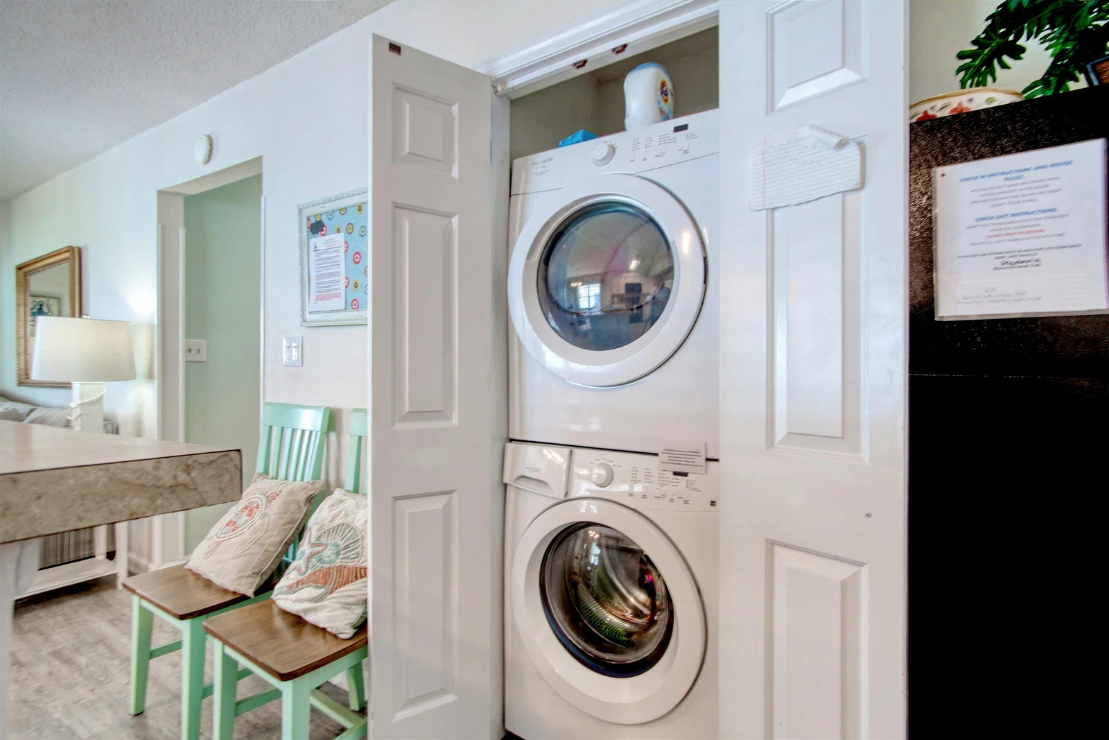 In-unit stacked washer and dryer