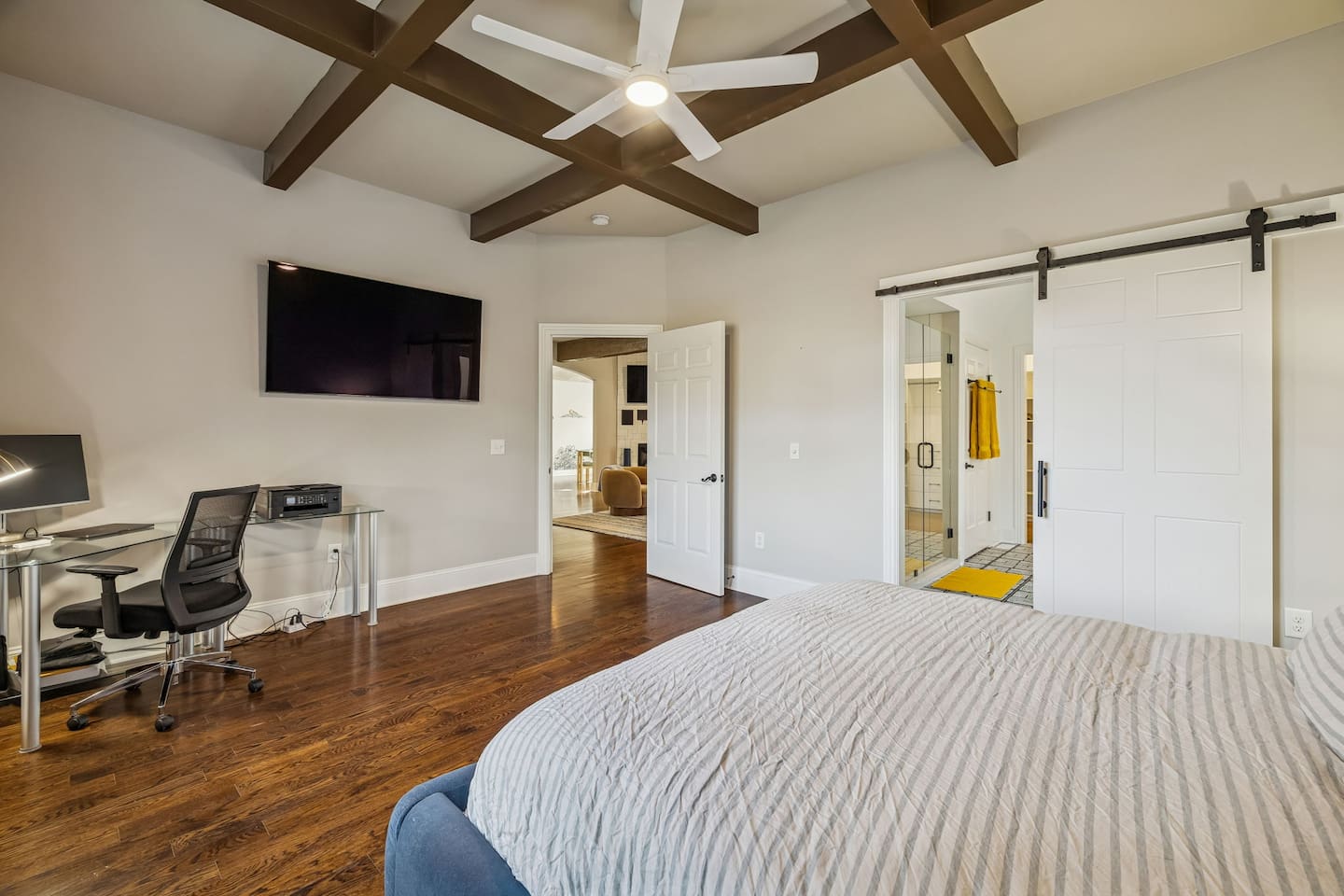 Master Suite is entered from the living room with a contemporary barn door entrance to newly remodeled Master Bath Room and Master Closet!