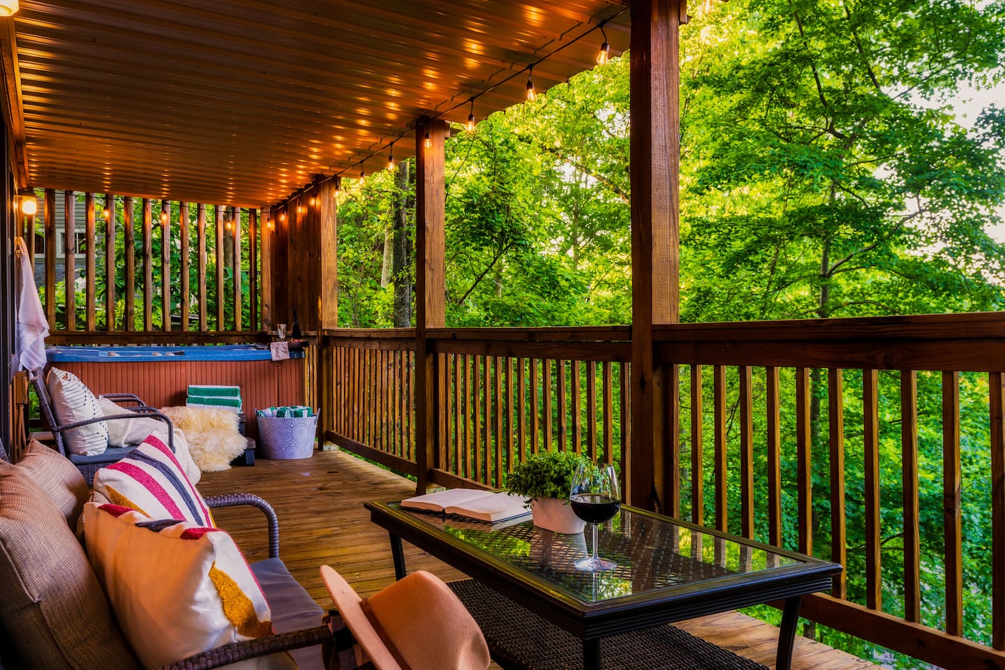 Access the main level porch for grilling, chilling and hot tub time - right off the kitchen & living room.