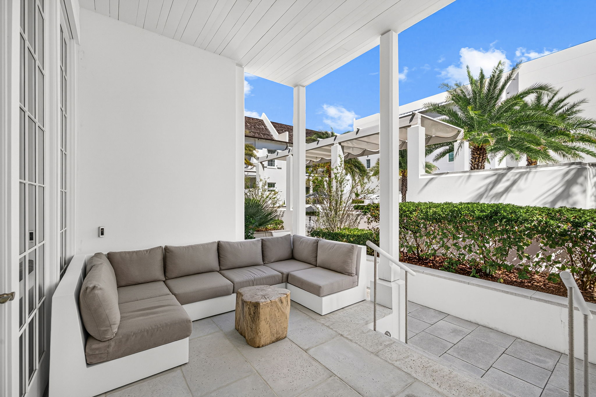 Enjoy spacious and comfortable seating options on the covered front porch, perfect for a morning cup of coffee or afternoon book.