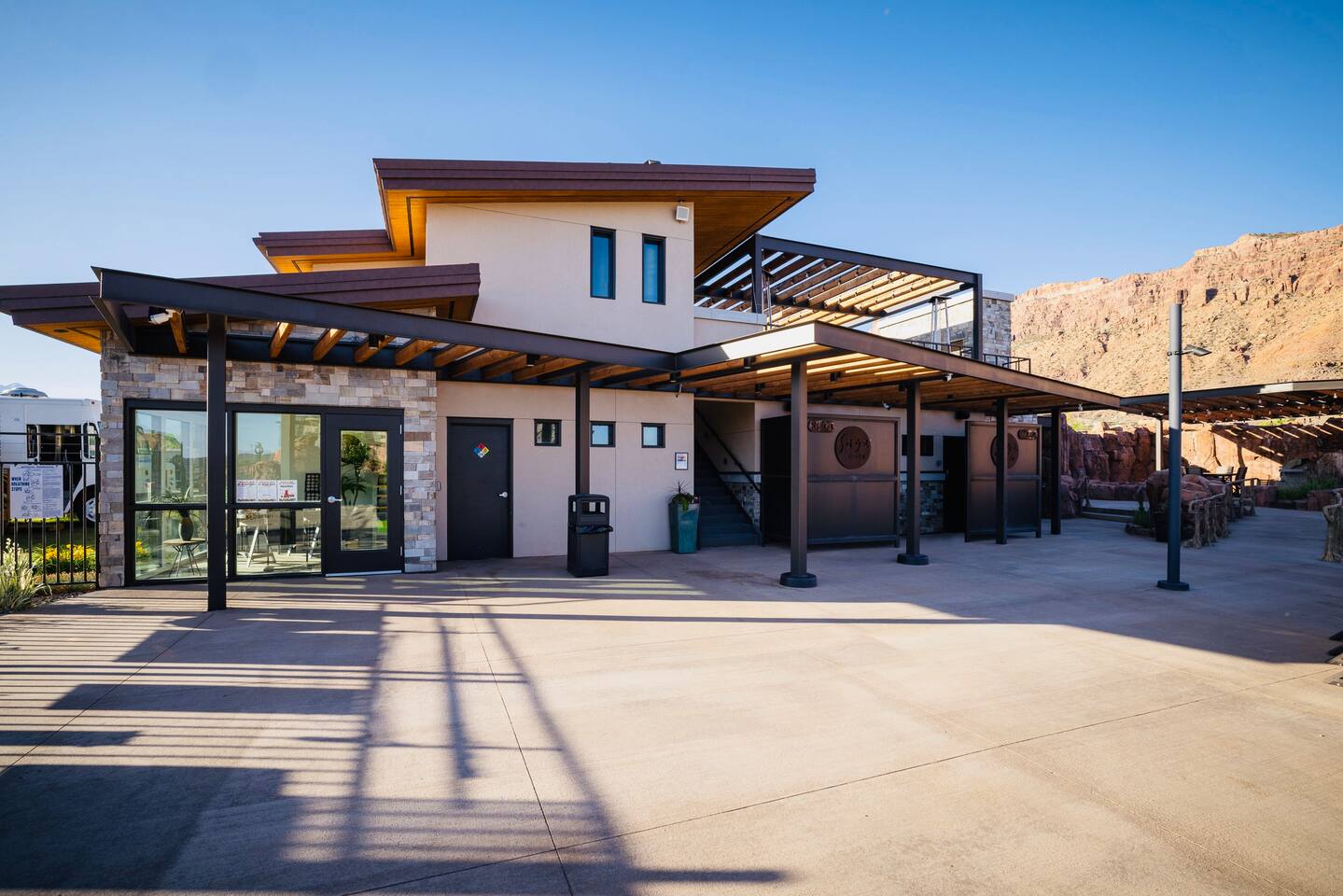 The modern clubhouse with a rooftop balcony