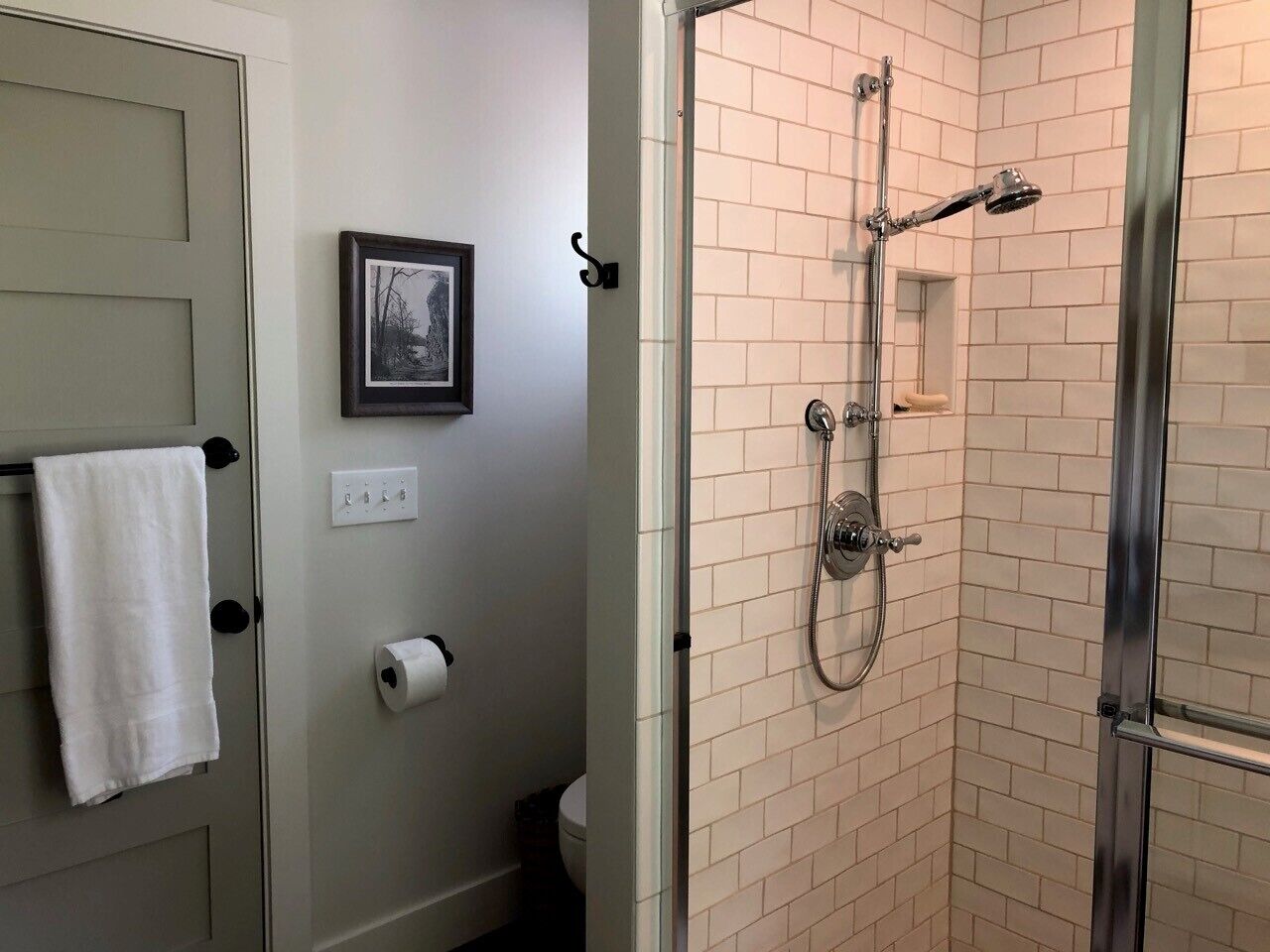 Upstairs en suite bathroom off of queen bedroom. Shower with adjustable head. 
