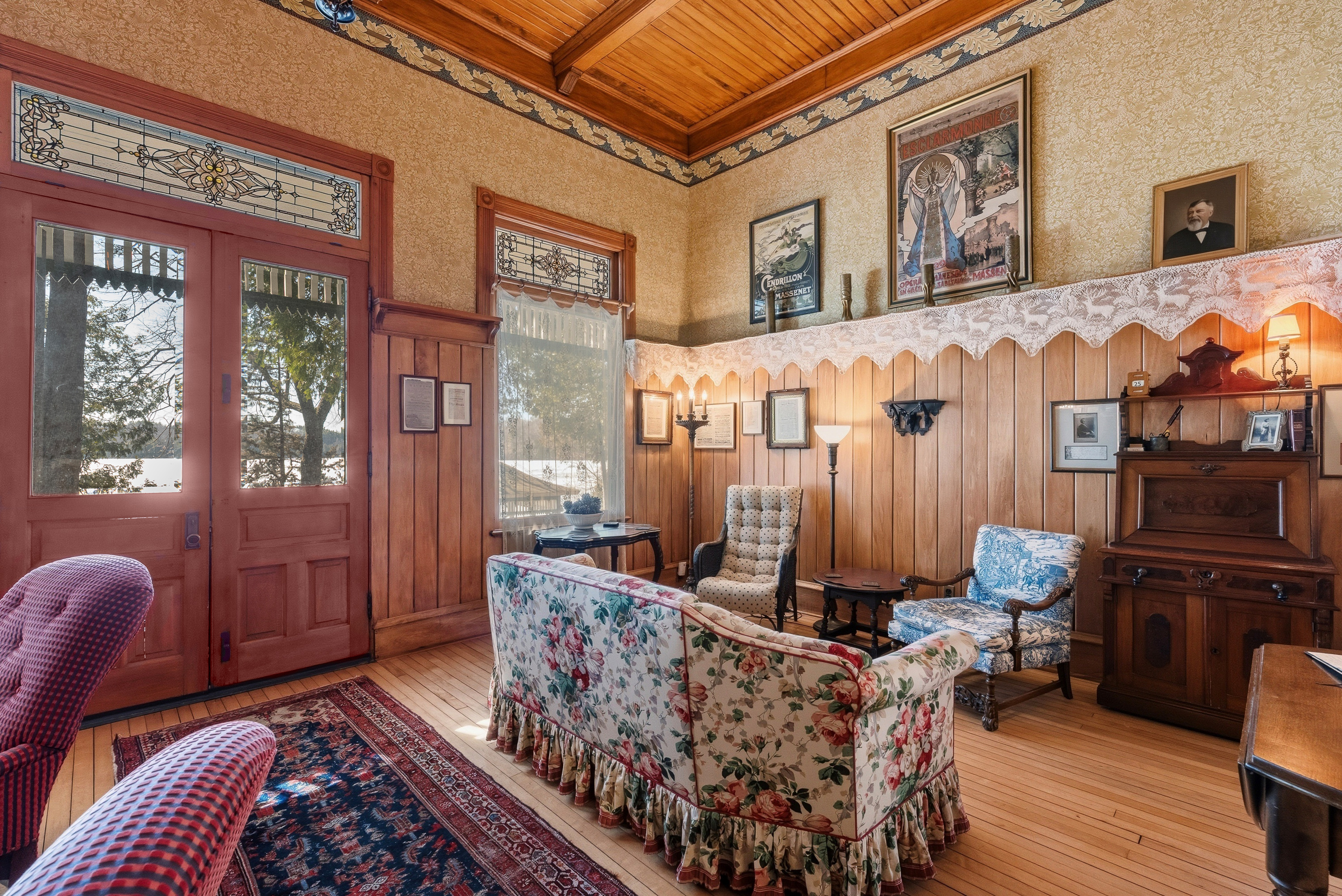 Inviting living room w/ plush seating & warm wood interiors