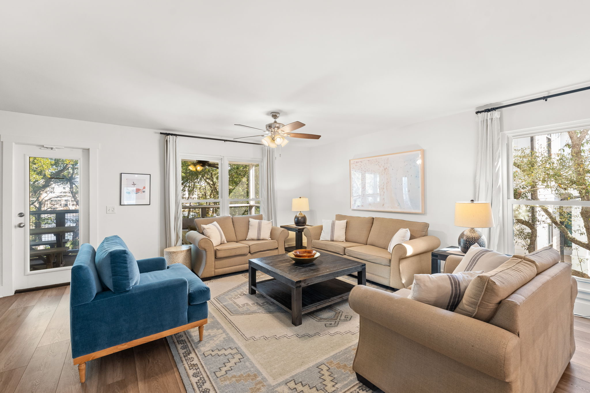 Side B: Socialize in the spacious 2nd-floor living room with plush seating.