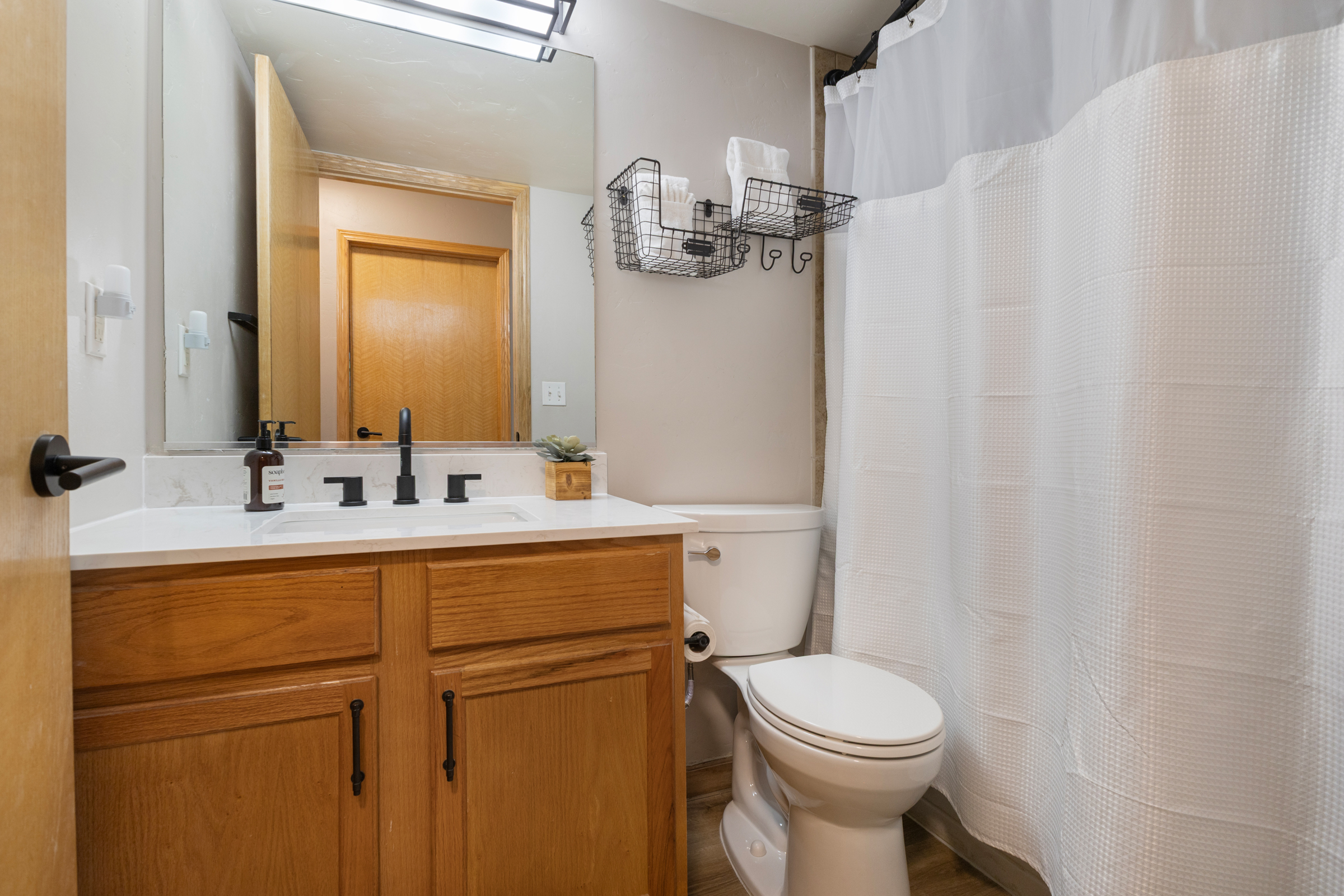 Bathroom 1 | Vanity and Toilet | Shower Tub Combo