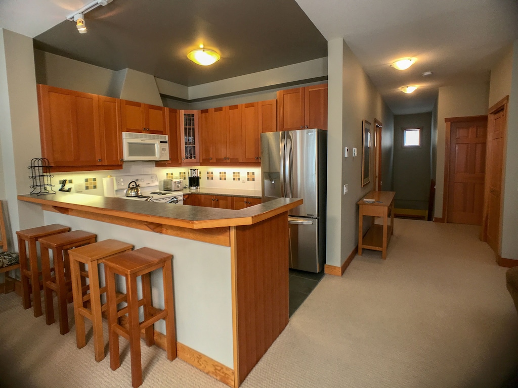 Kitchen and hallway to bedrooms