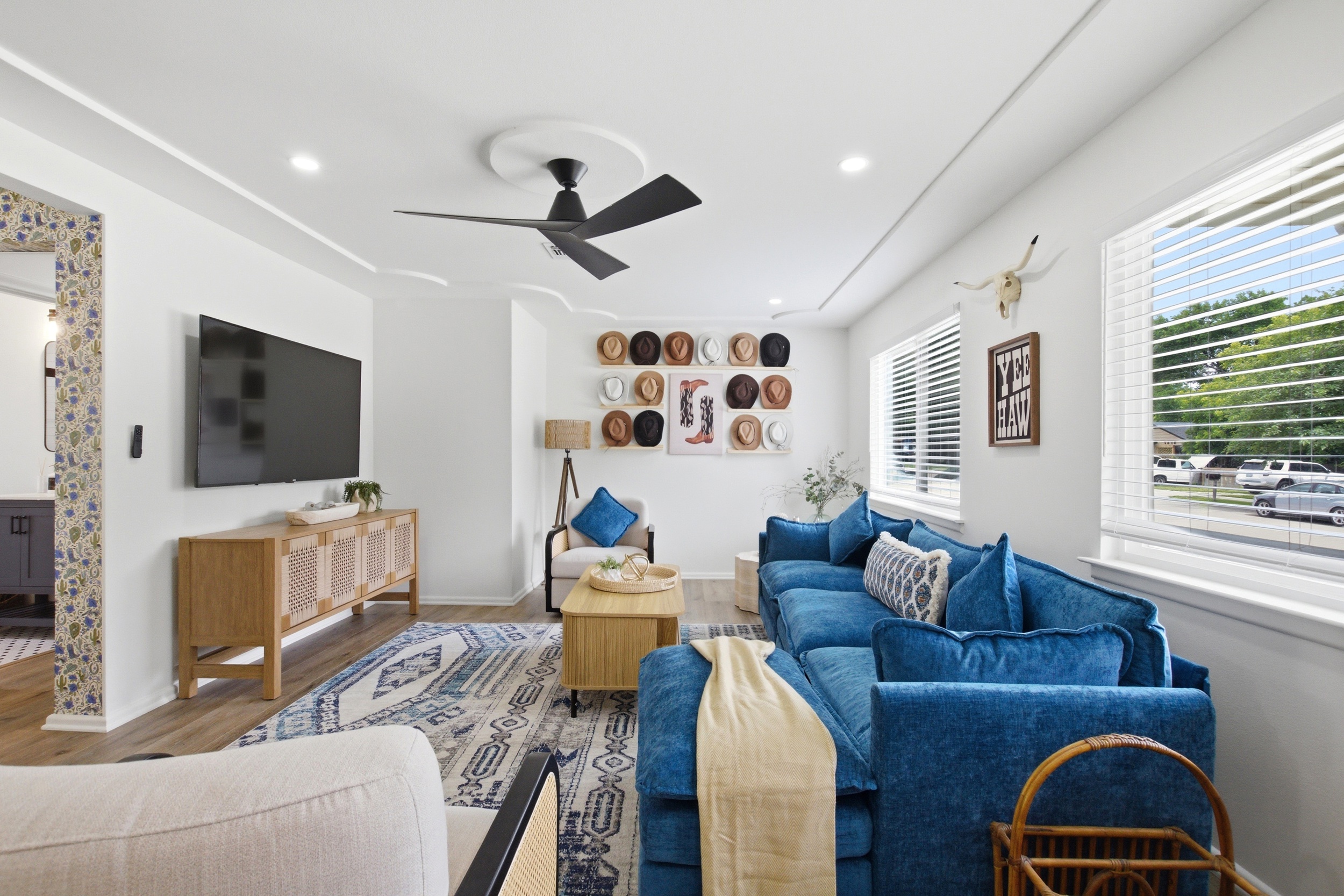 Bright Living Room with 65 inch Smart TV, Roku Streaming, and comfortable seating for the full group. Board Games available for cozy evenings in.
