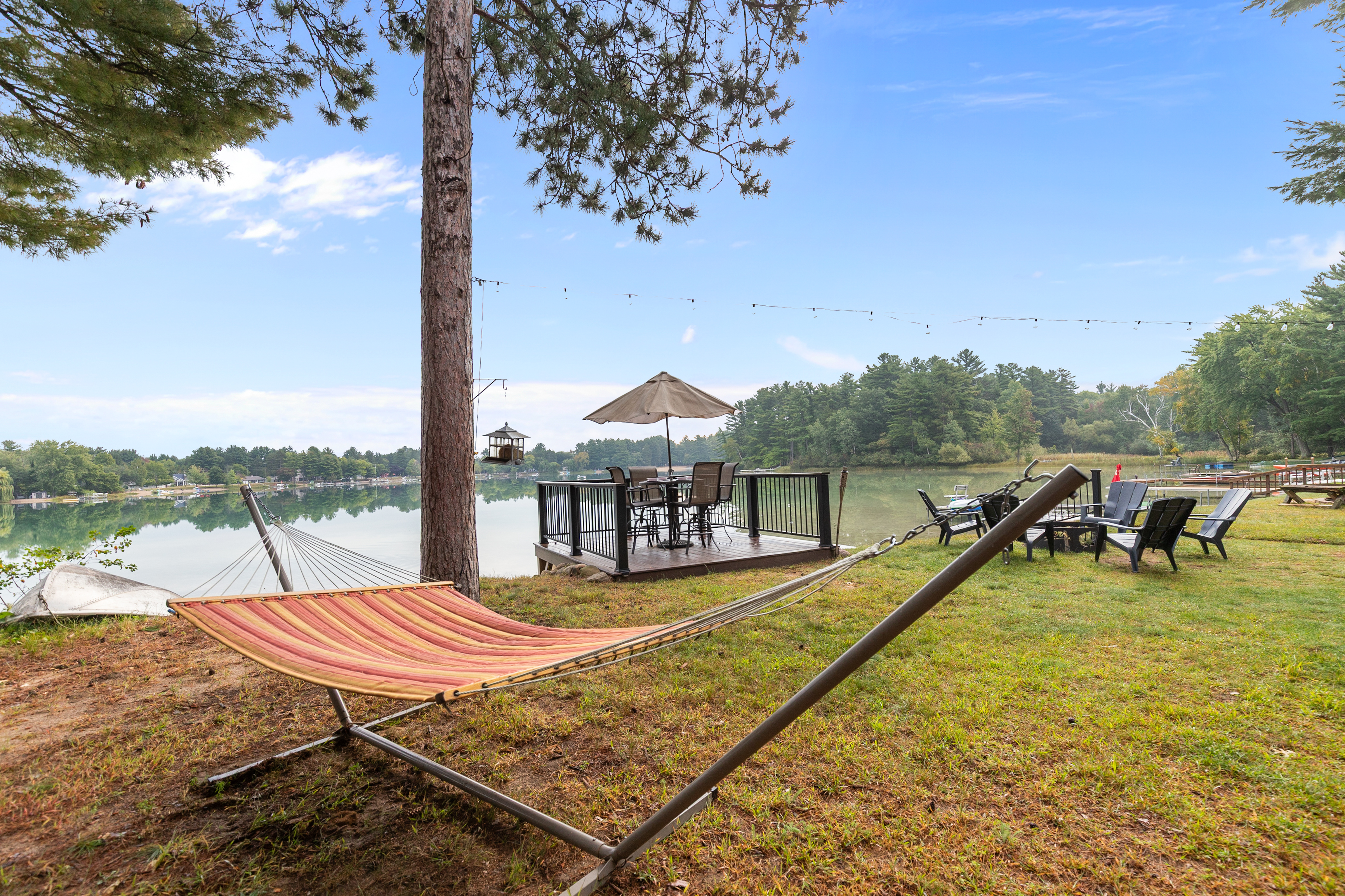 Enjoy a peaceful snooze in the hammock—lake breezes and pure relaxation included.
