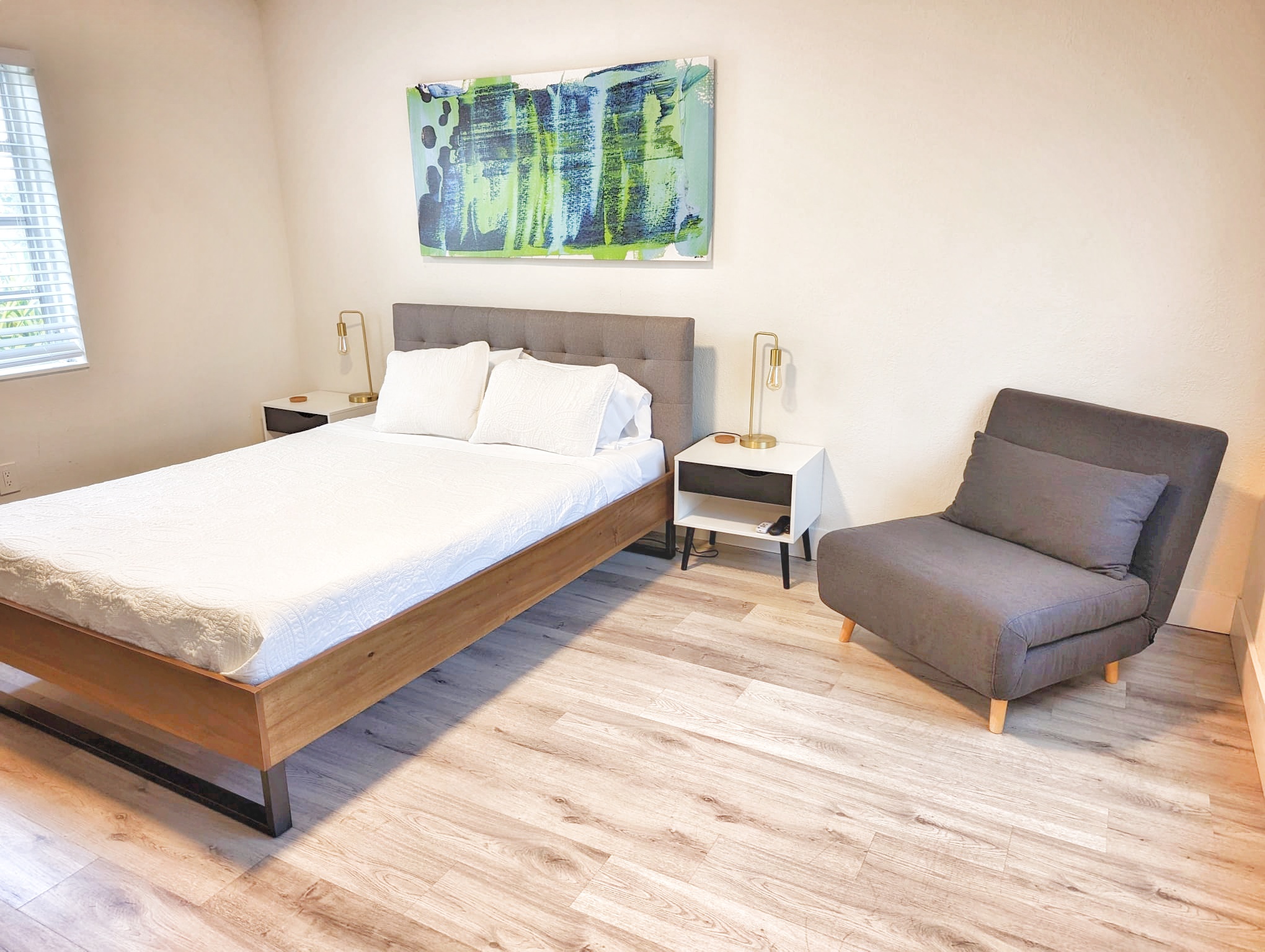 Queen bed with comfy lounge chair