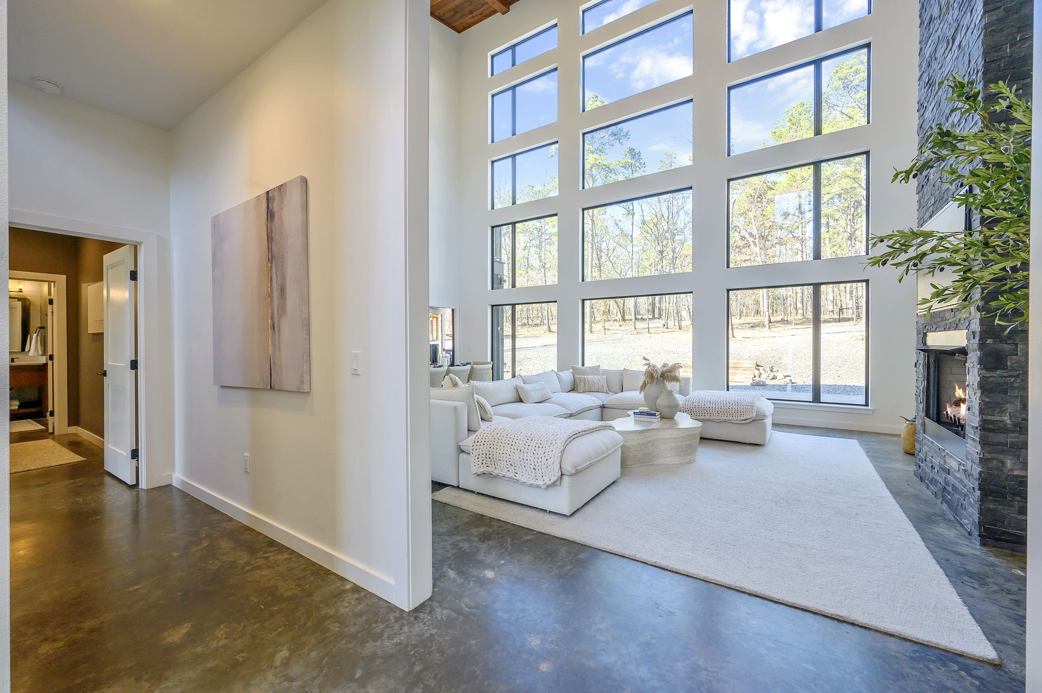 Modern and luxurious living space with high-end finishes and furniture throughout