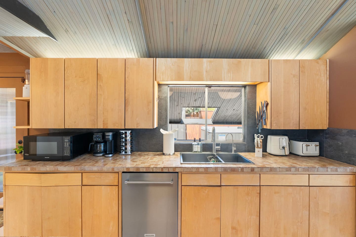 Fully equipped kitchen with sleek cabinetry and everything needed for a comfortable stay.