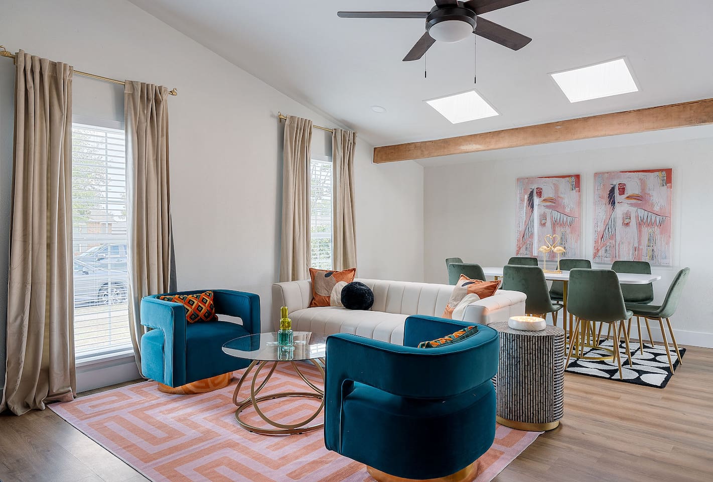 Step into this welcoming living area, highlighted by a sleek fireplace with a mounted TV. Comfortable and beautiful seating arrangements make it perfect for relaxation.