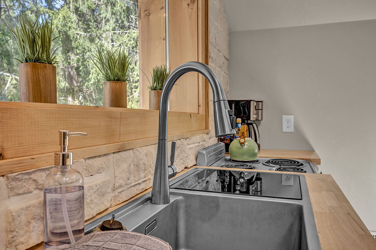The Penthouse: Dishwasher/sink combo. - old
