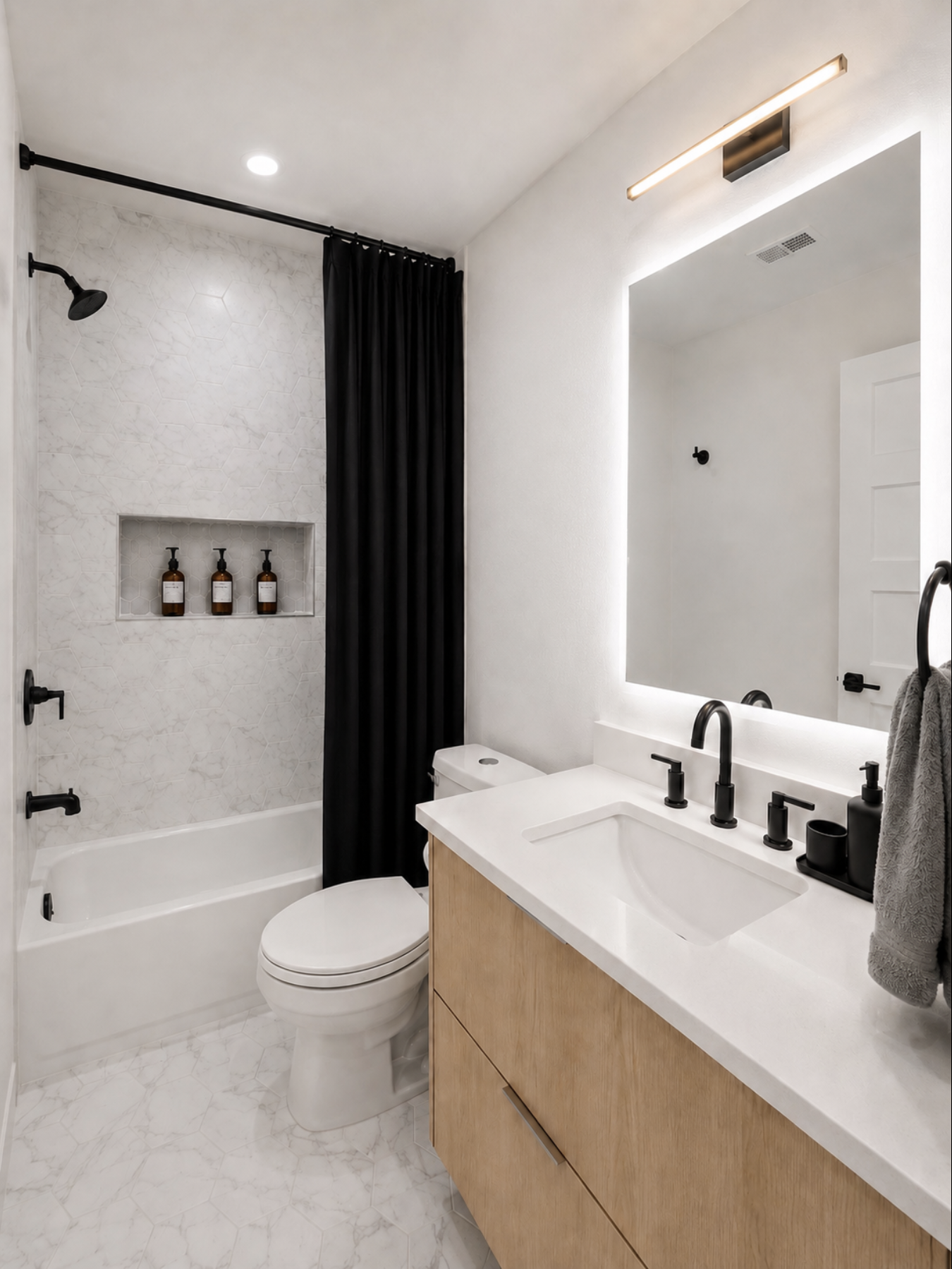 Elegant marble and modern fixtures for a refreshing experience!