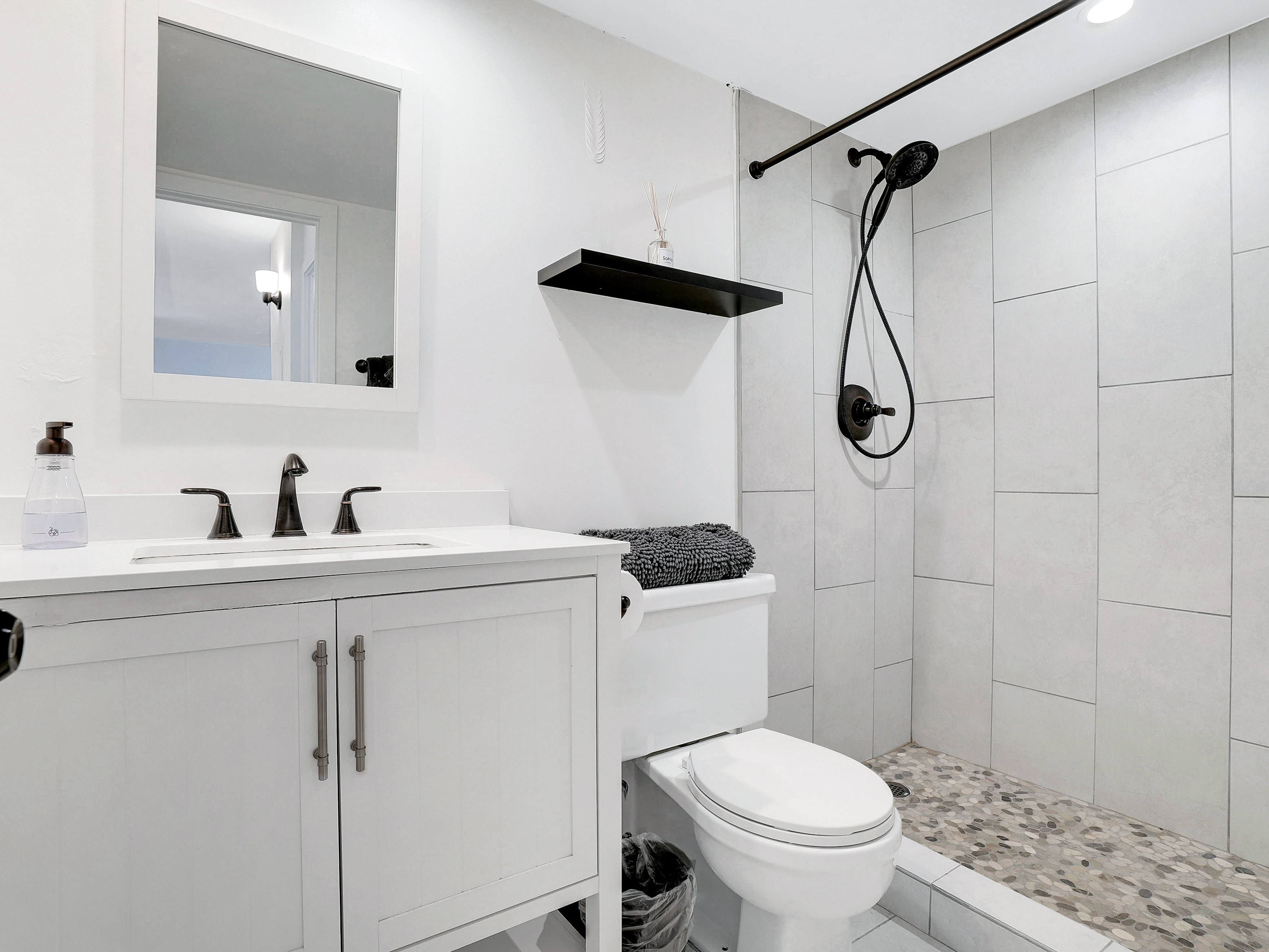 Second bathroom, also with a tile and stone walk-in shower