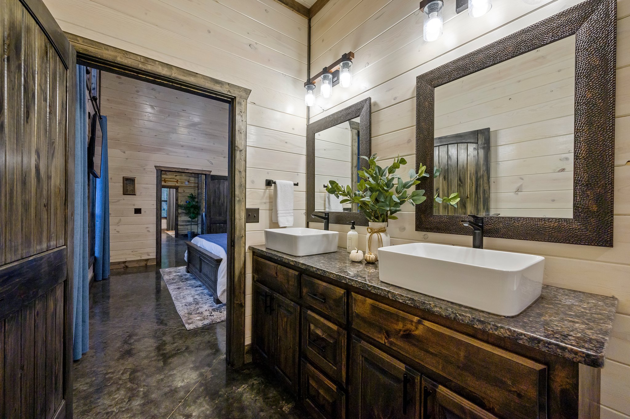 Sleek designer bathroom featuring high-end finishes and rustic charm.