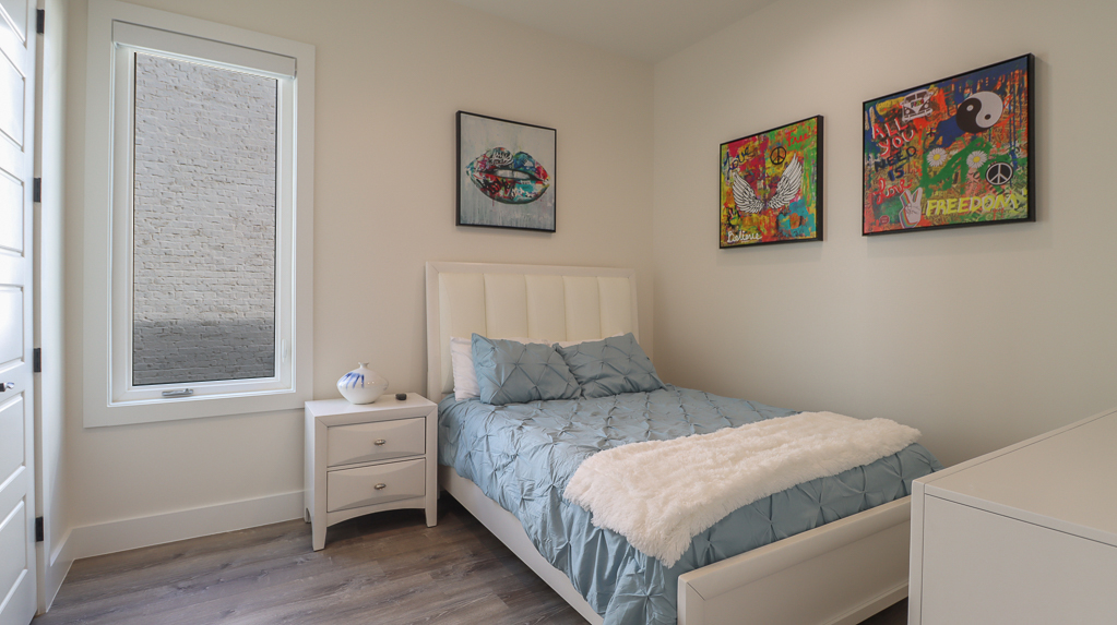 Queen Bedroom with Flat screen TV at Your Beach House