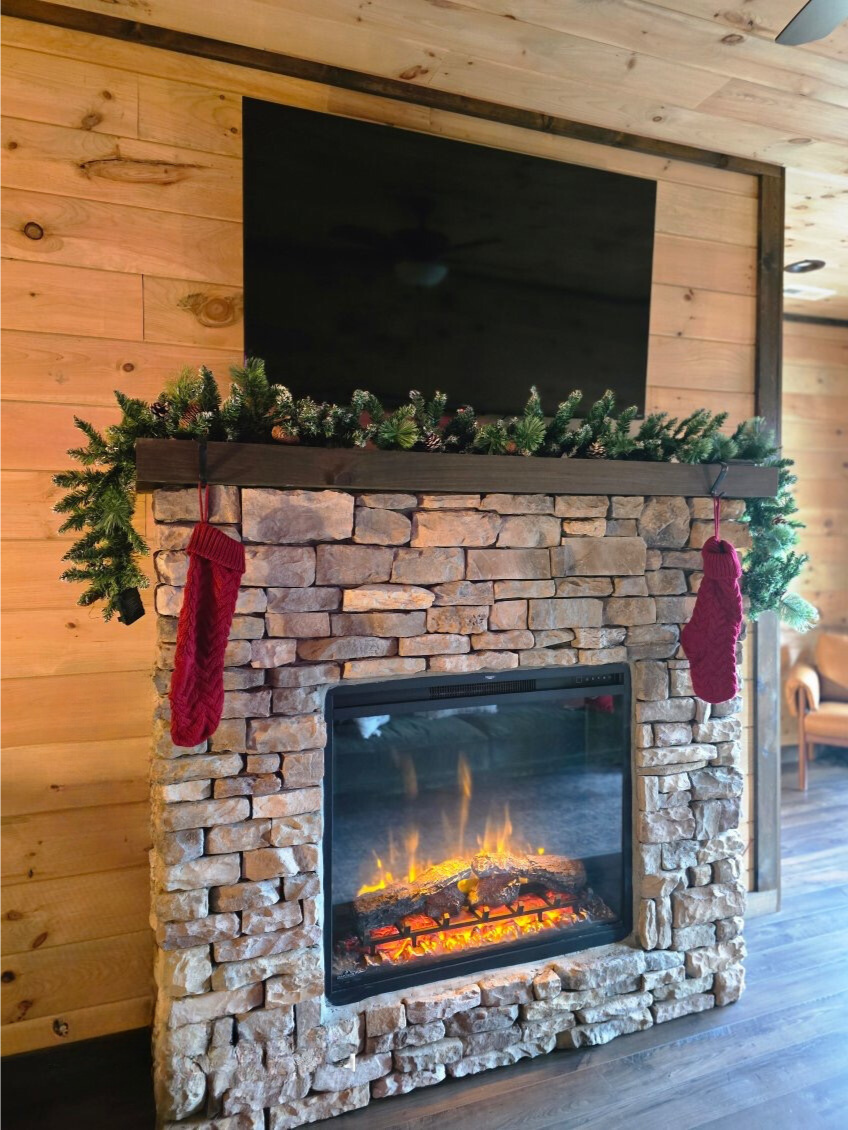 The cabin is decorated for the holidays - 2nd floor living room